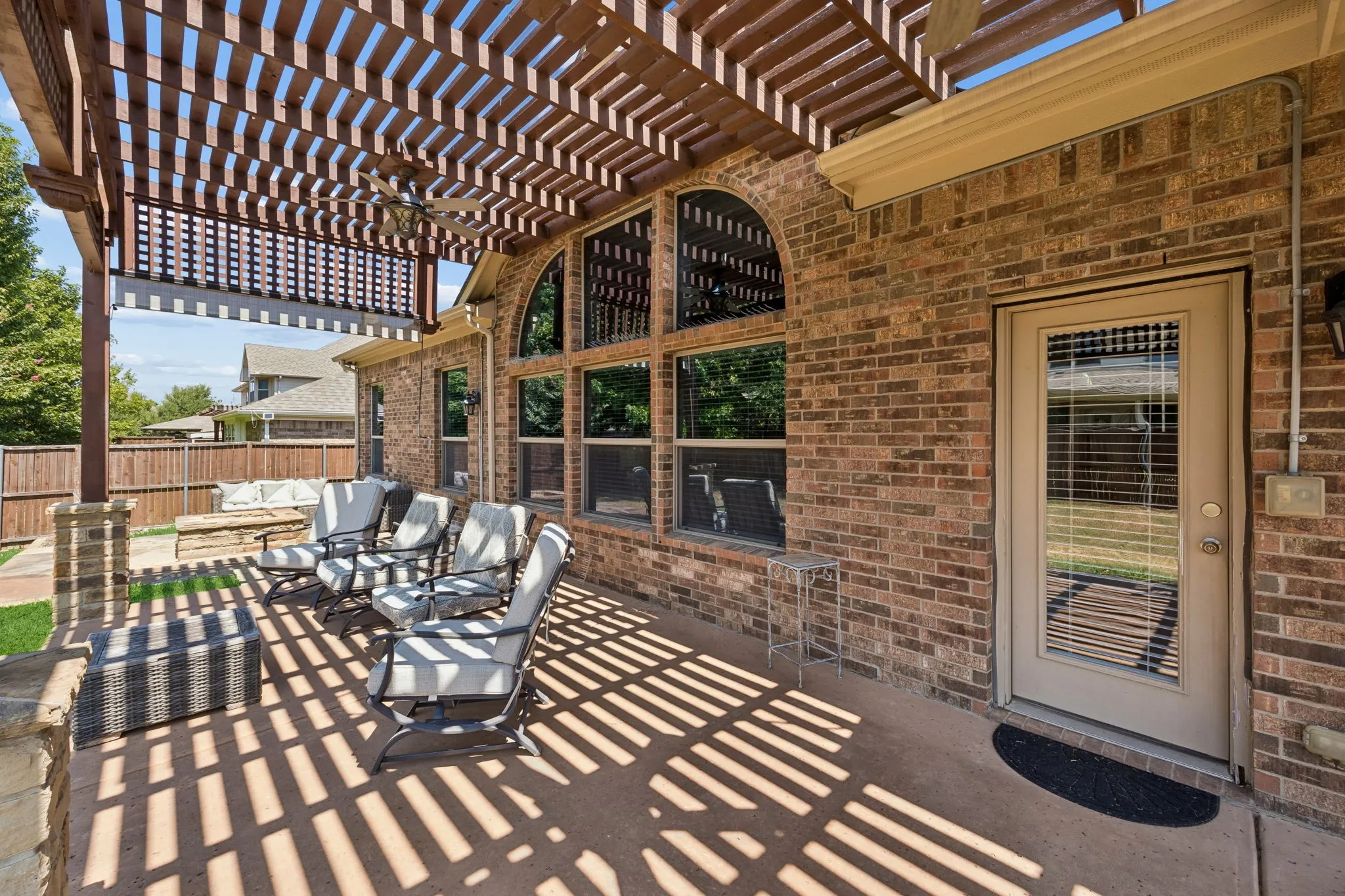 Large extended patio with pergola