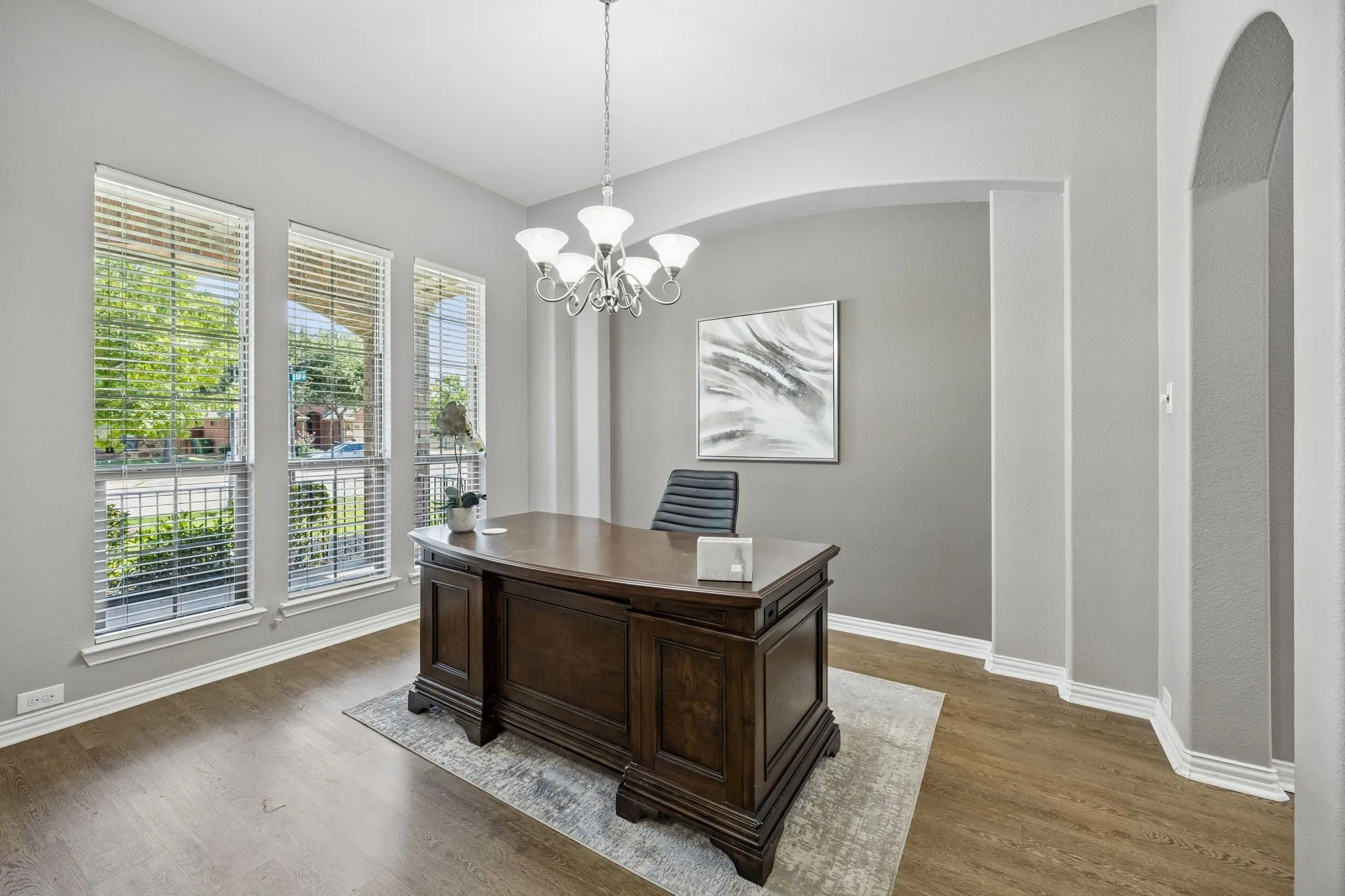 Staged as an office but can also be a dining room