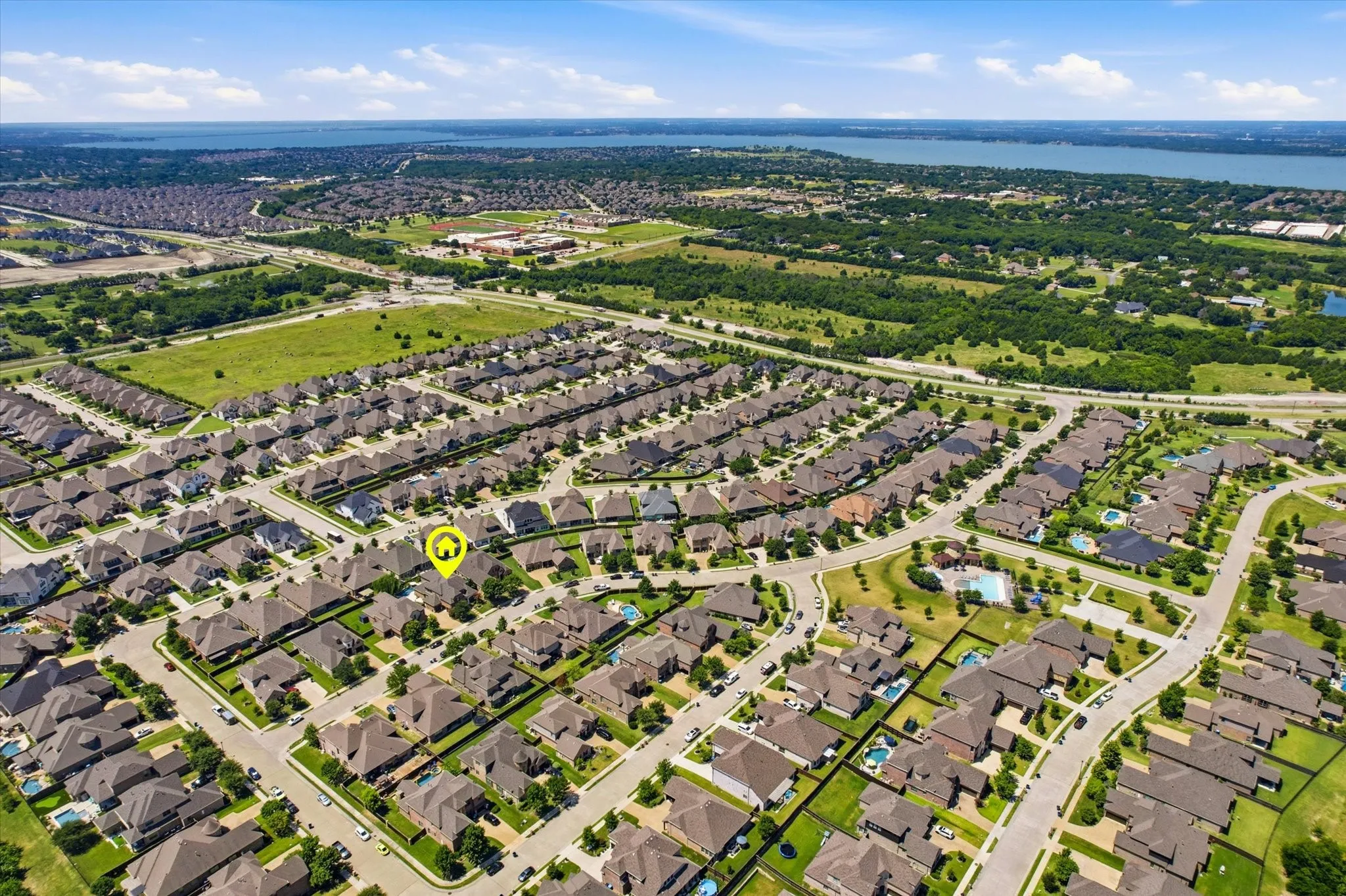 Established suburban community featuring tree-lined streets, curved cul-de-sac design, and consistent architectural styling throughout the neighborhood