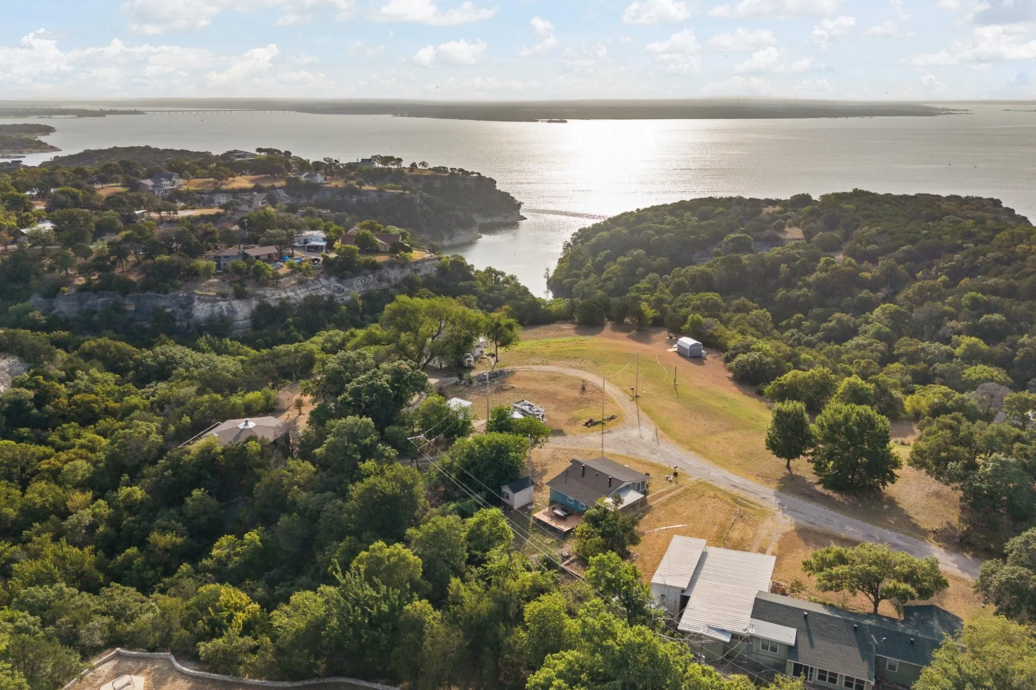 Waterfront property with expansive treed lot and substantial elevation