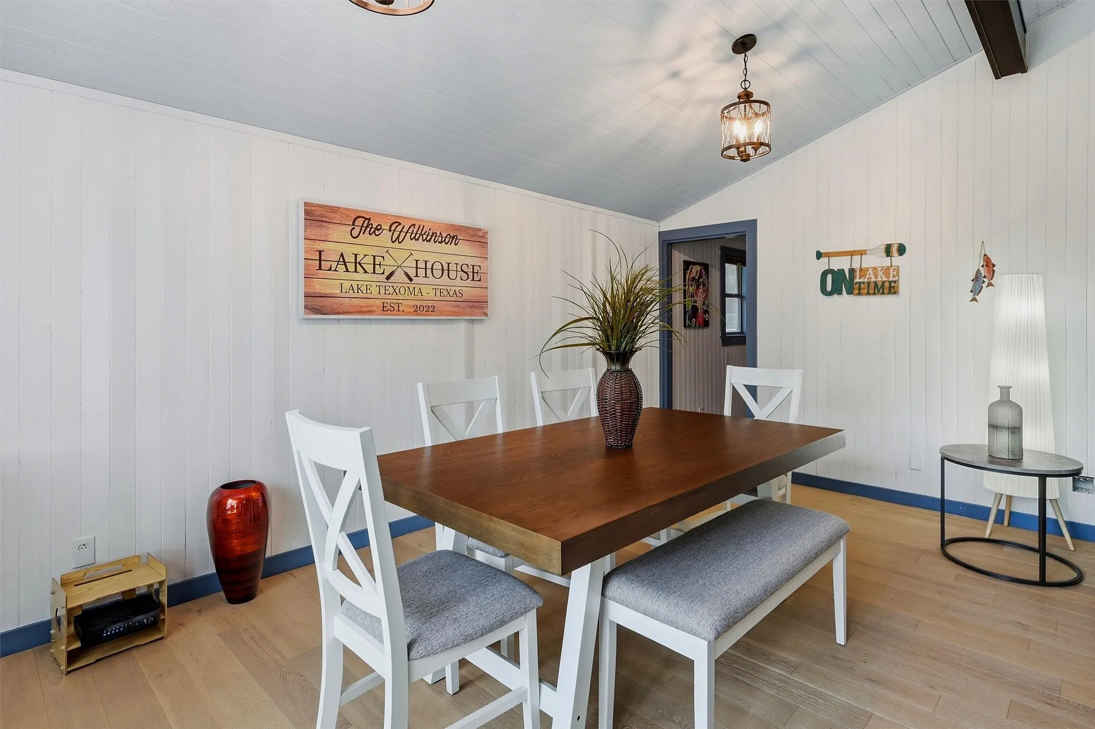 Wood-finish flooring with vertical paneled walls