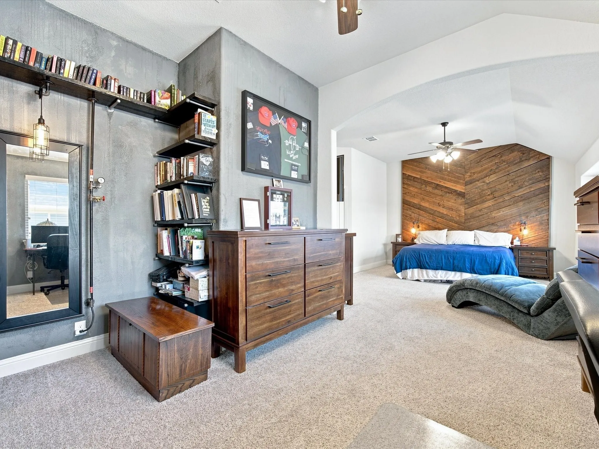 Primary bedroom with wood timber wall