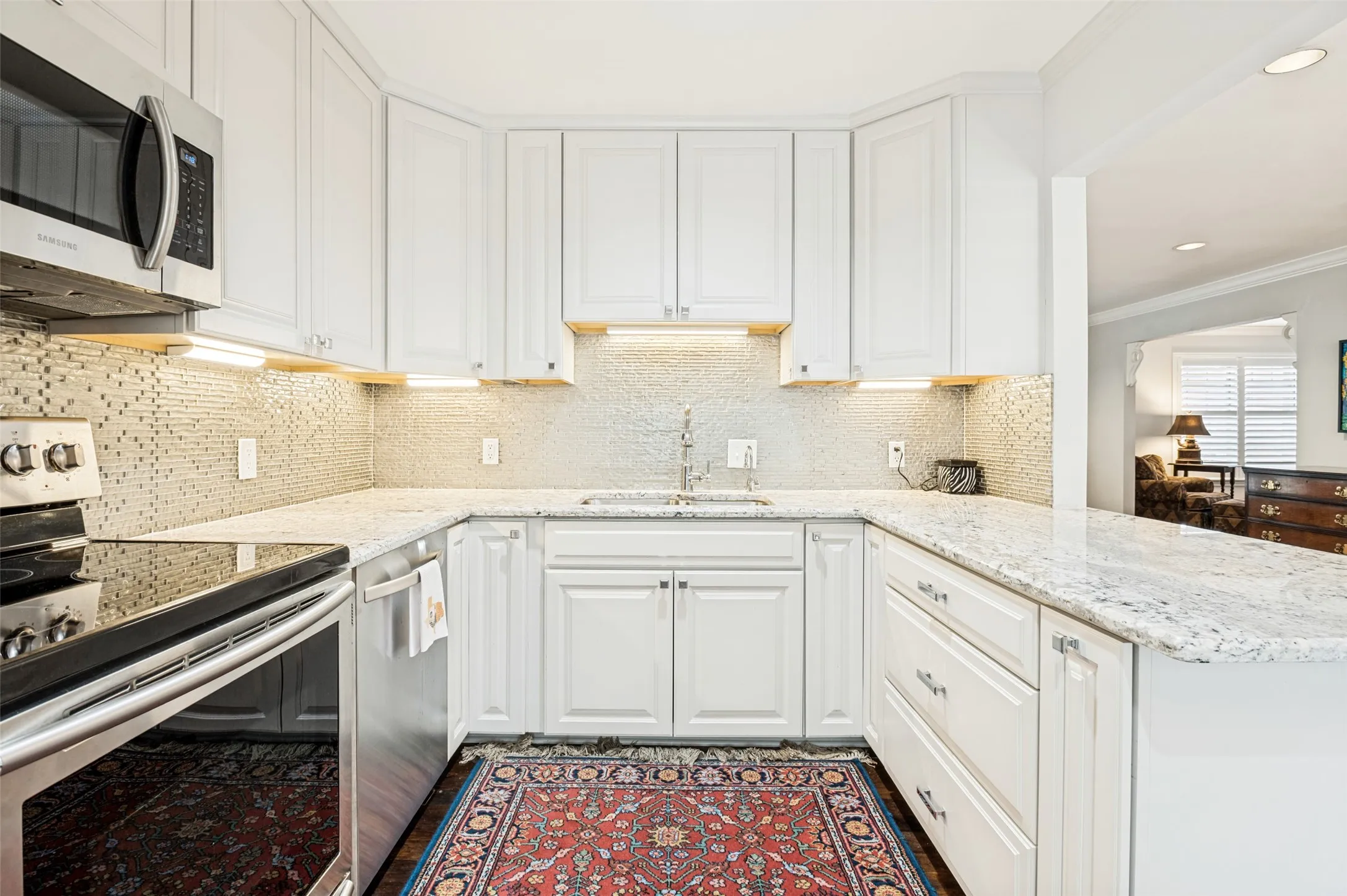 Updated cabinets, counters, backsplash