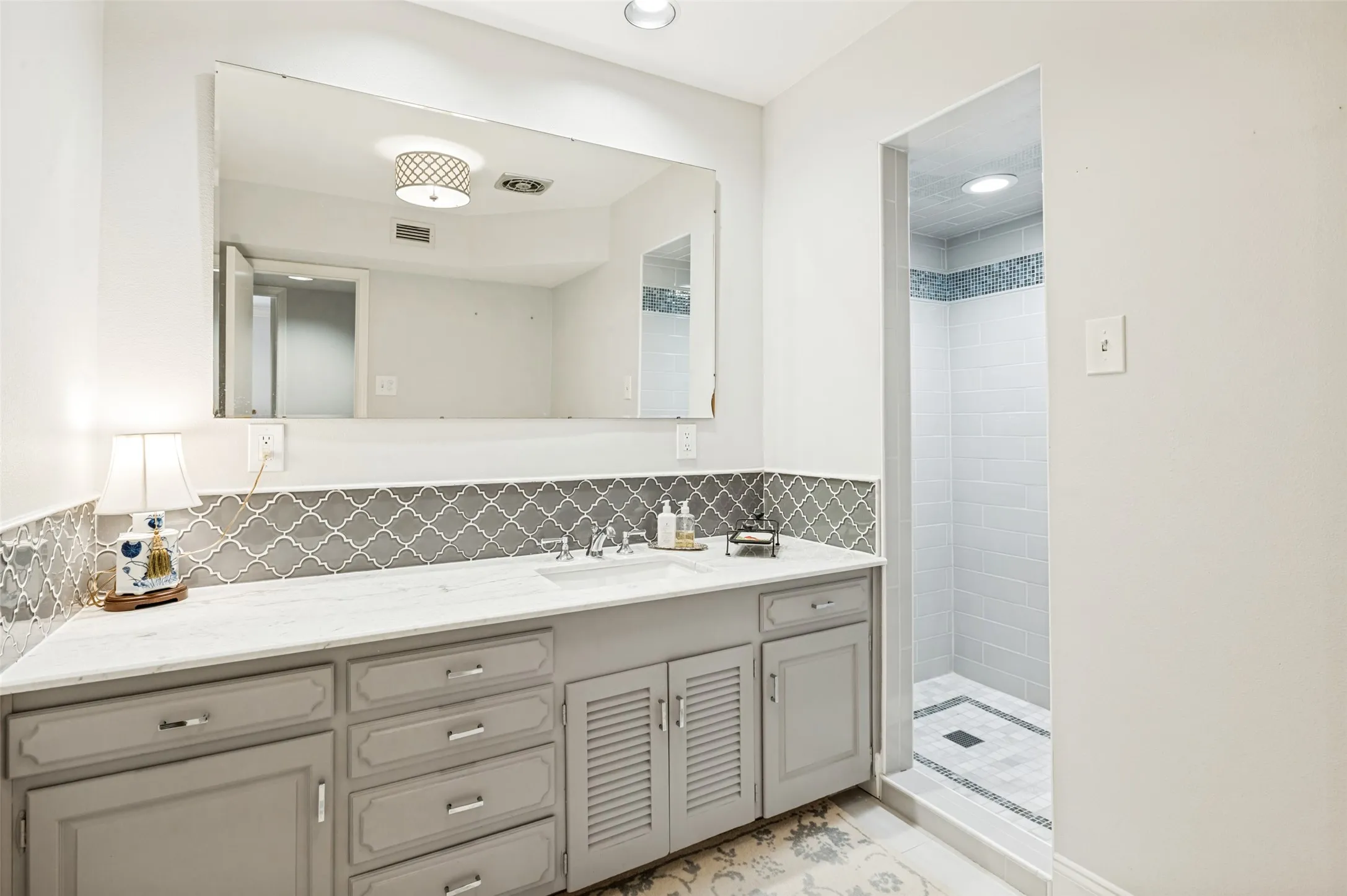 Hall bath updated shower, tile, floor and shower