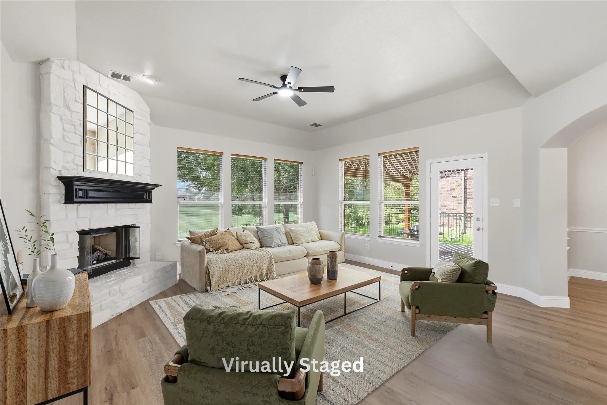 1581 Meadows Avenue boasts a light and bright family room overlooking the golf course.