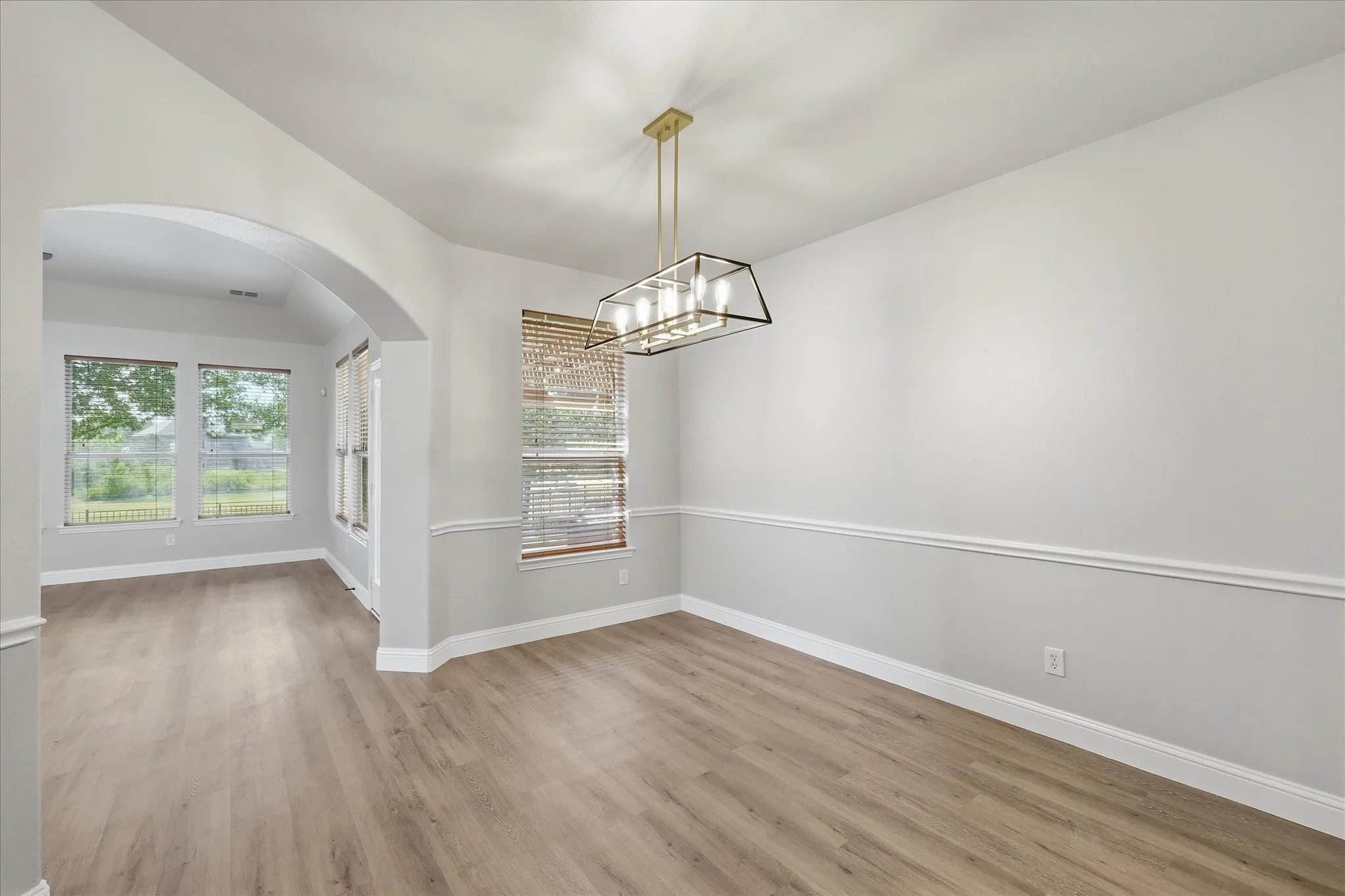 Perfect for entertaining, the dining room is open to the rest of this lovely home.