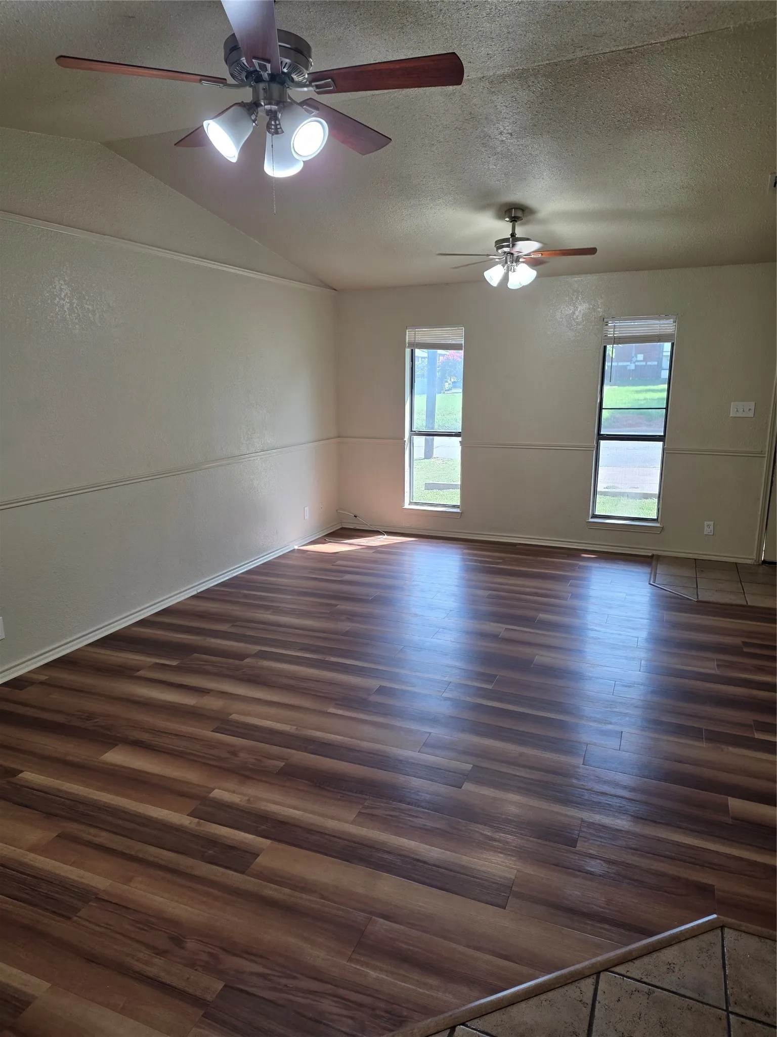 Large living room with 2 ceiling fans