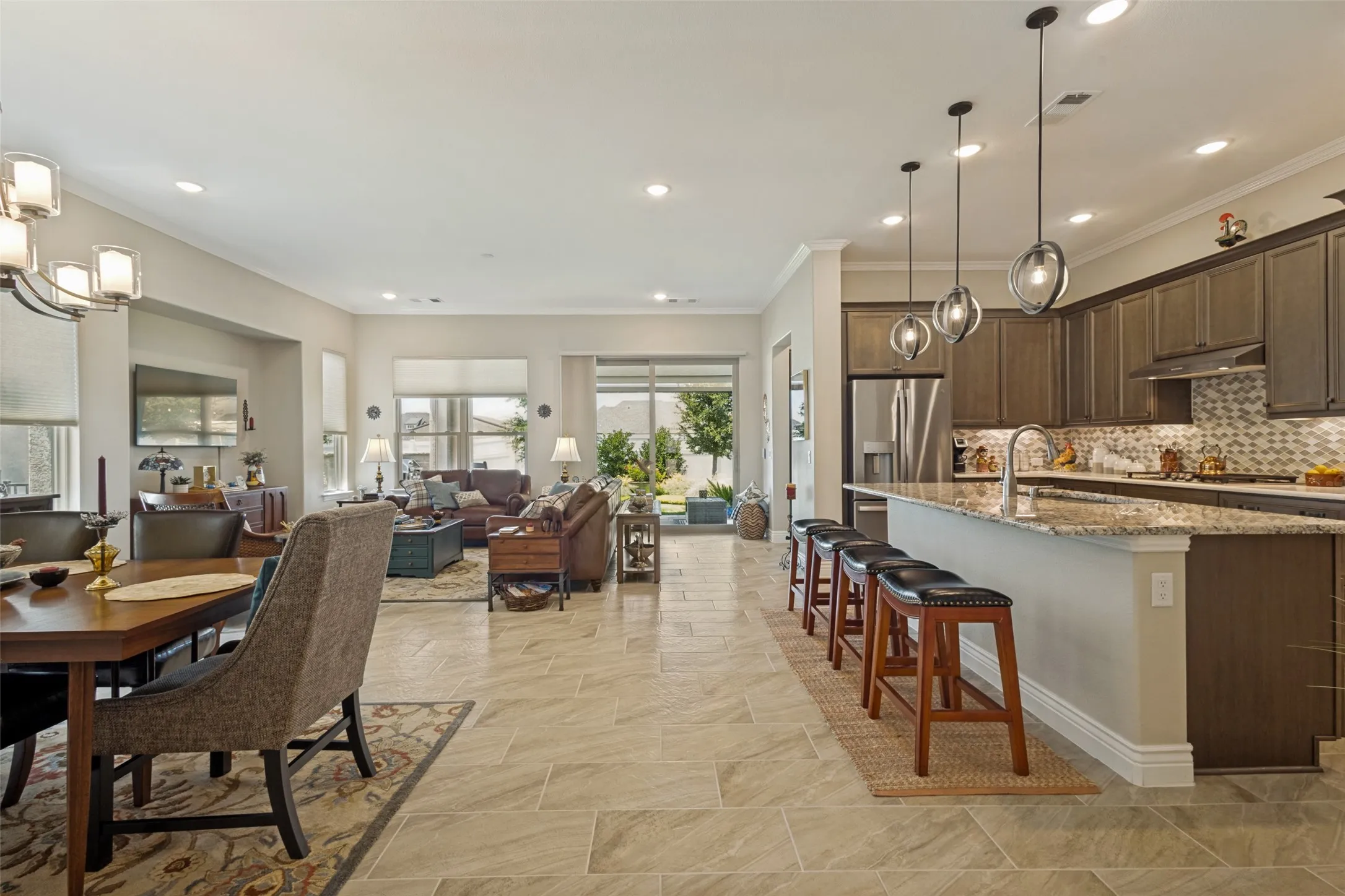 A GREAT VIEW OF THIS LARGE OPEN FLOOR PLAN FILLED WITH NATURAL LIGHT.