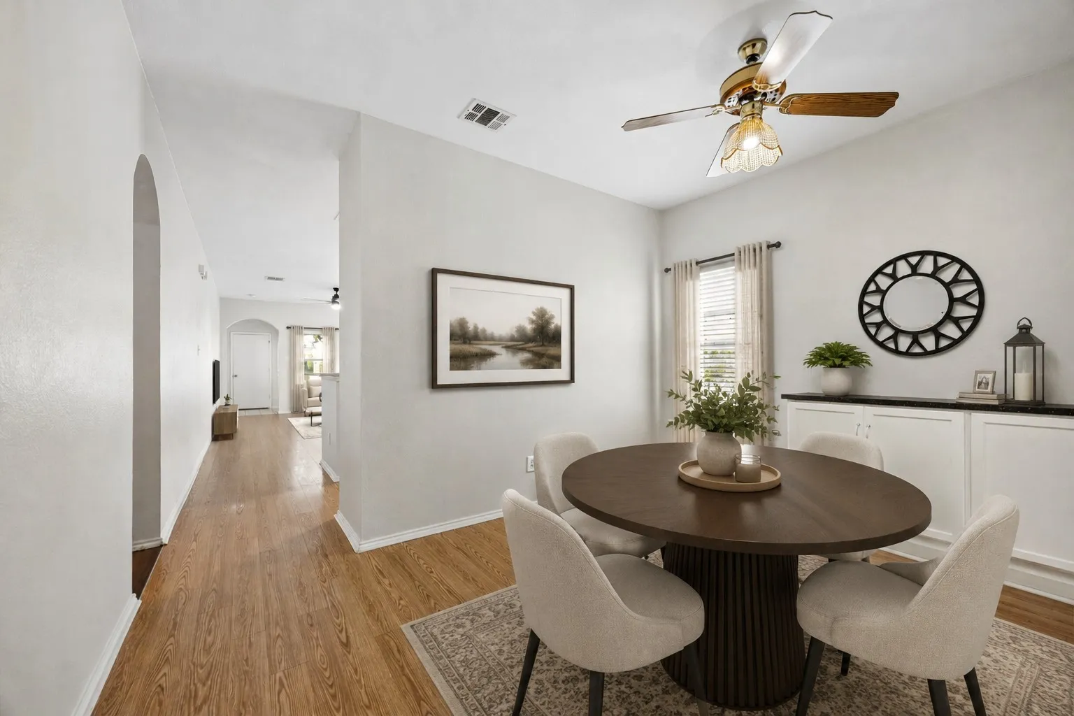 Virtually staged dining room/ office.