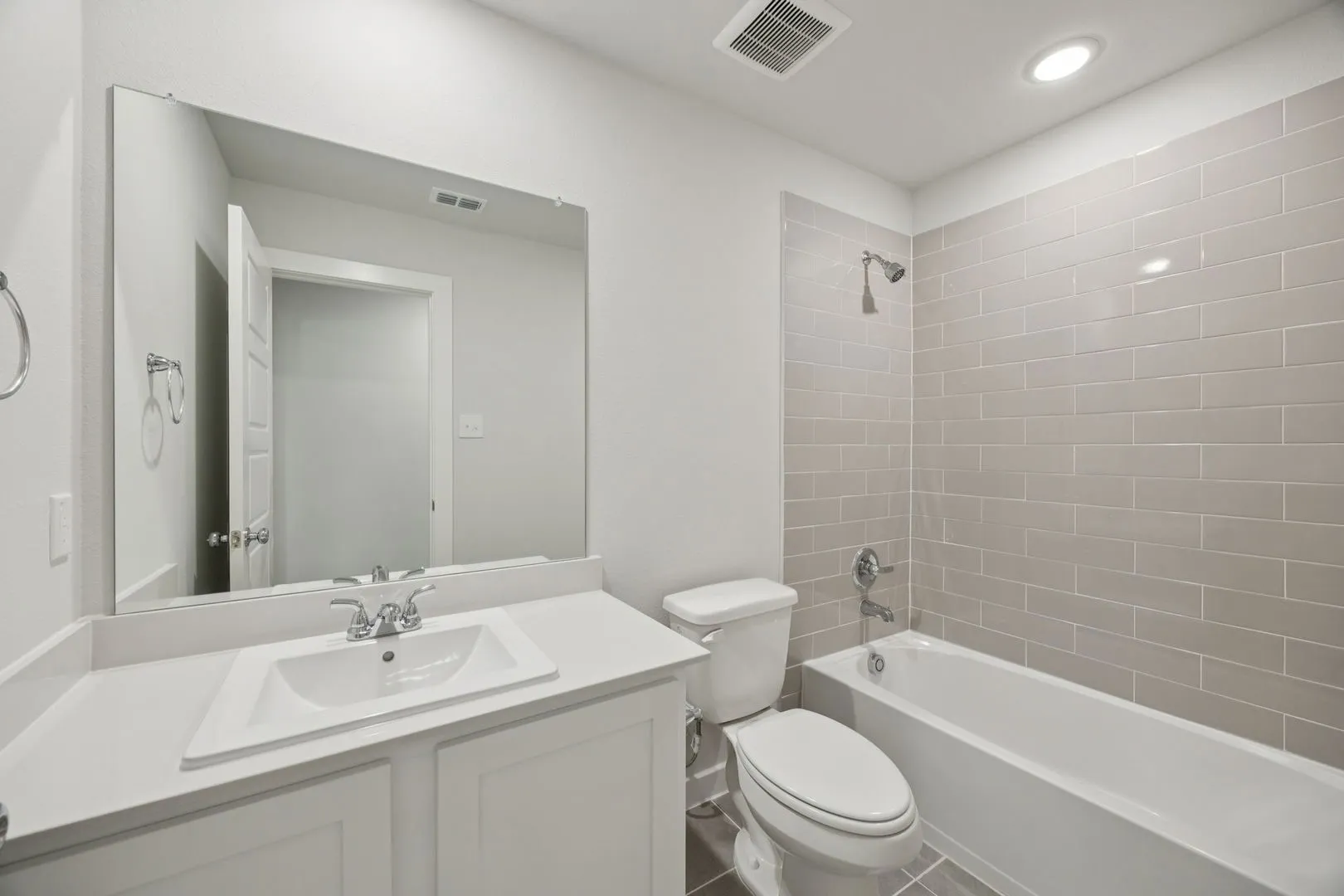 Bathroom in the Hadley home plan by Trophy Signature Homes – REPRESENTATIVE PHOTO