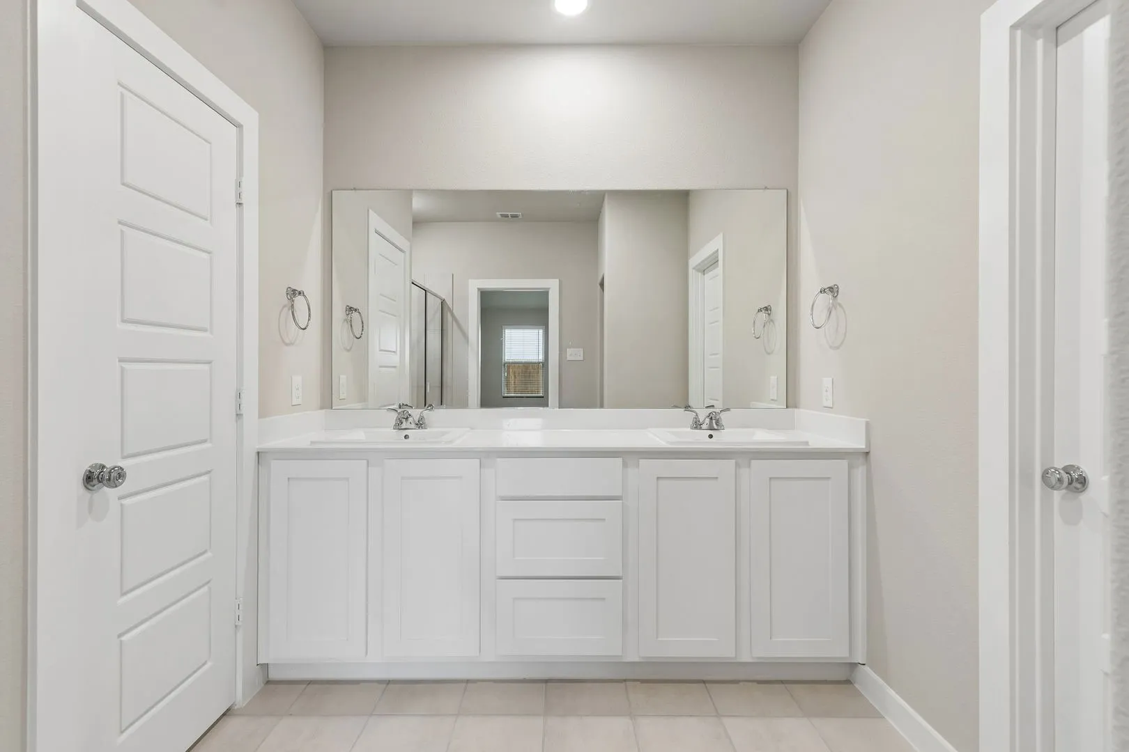 Primary Bathroom in the Emmy II home plan by Trophy Signature Homes - REPRESENTATIVE PHOTO
