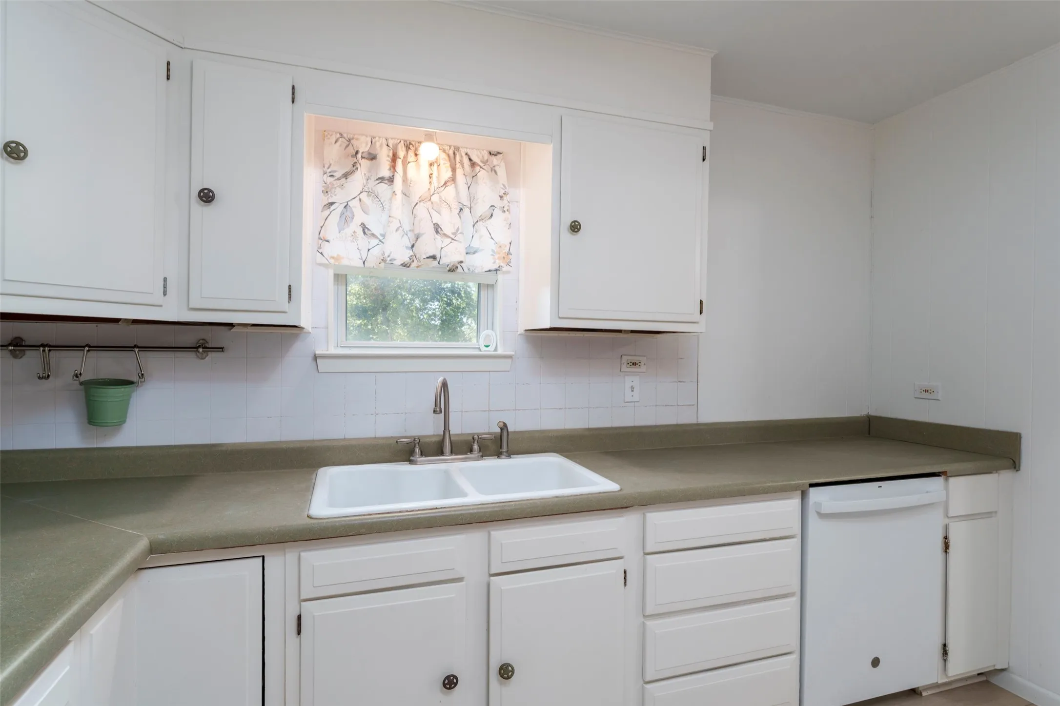 White cabinetry with classic hardware