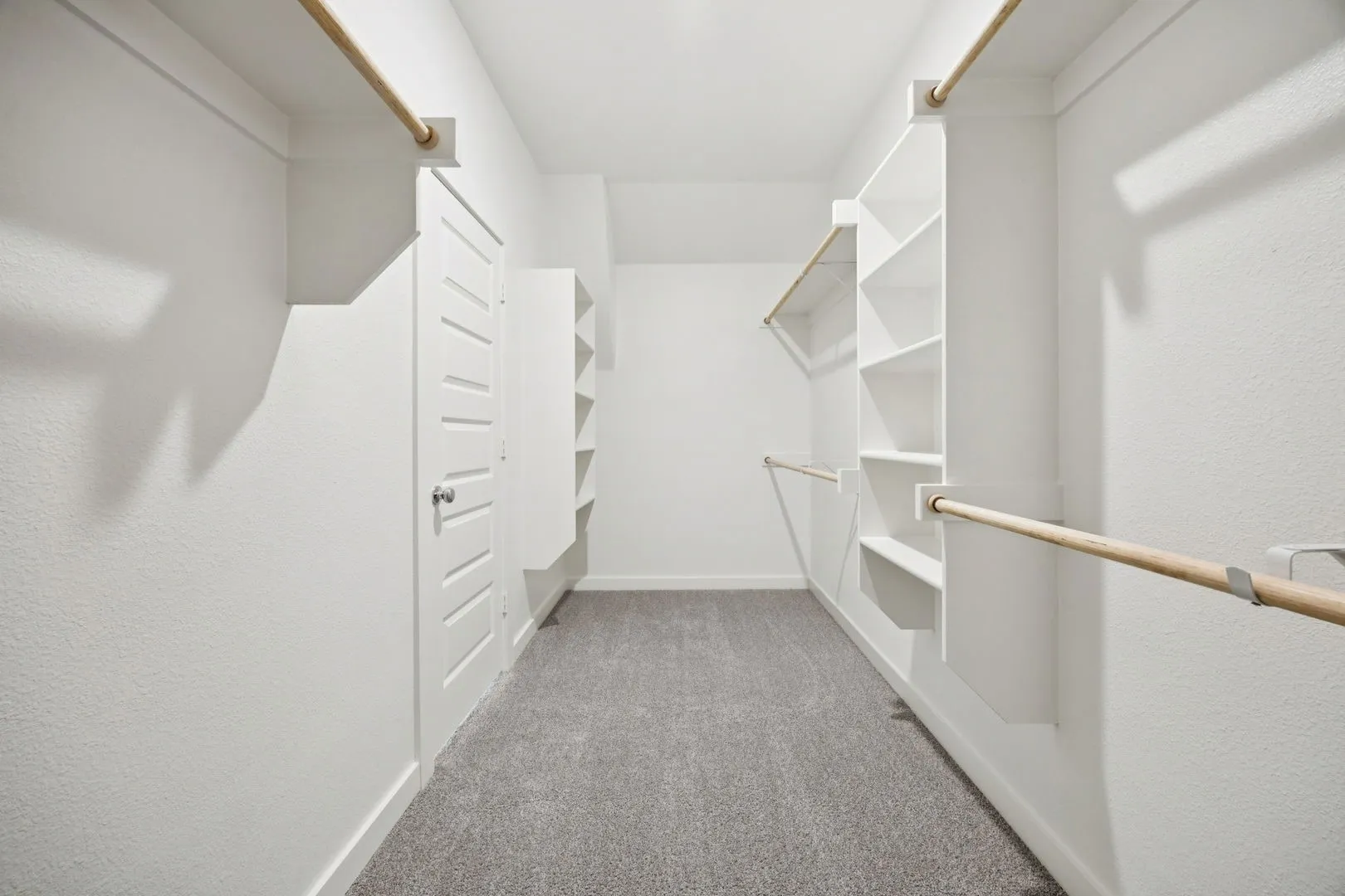 Primary Closet in the Heisman home plan by Trophy Signature Homes – REPRESENTATIVE PHOTO