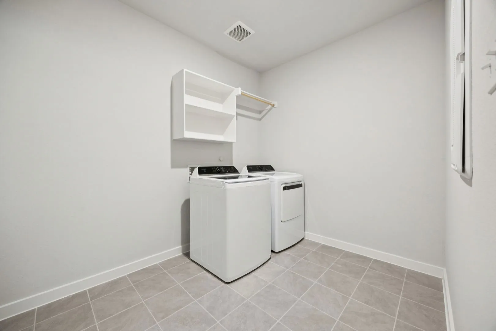 Utility Room in the Heisman home plan by Trophy Signature Homes – REPRESENTATIVE PHOTO