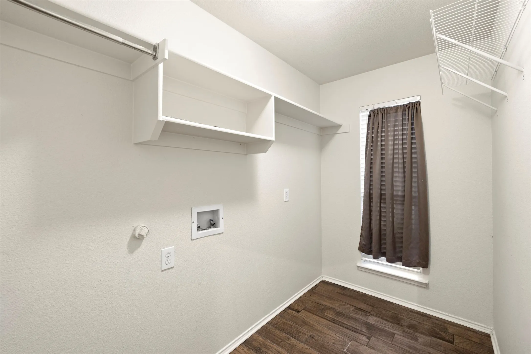Extended laundry room provides even more storage space or room for that second refrigerator or freezer