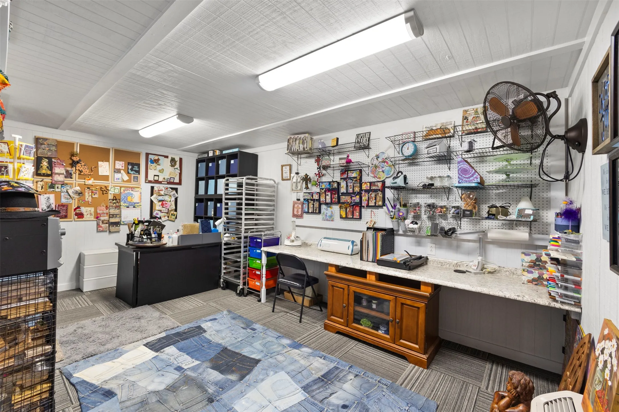 Currently a crafting area, but can be repurposed to fit many needs! Man cave, office space, exercise area, extra storage, you name it.