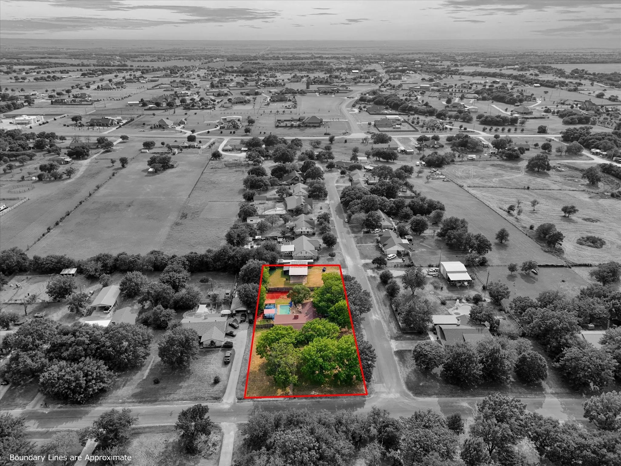 Additional contentThe aerial perspective does not provide sufficient detail of the primary residence's architectural features, finishes, or specific property amenities