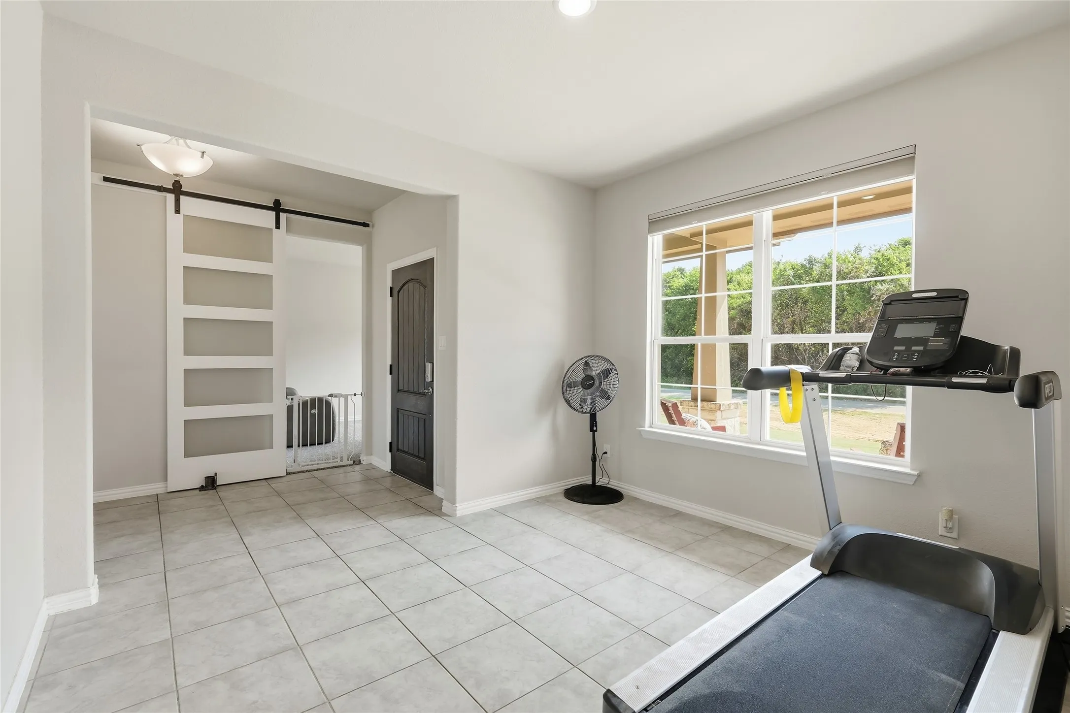 Light-toned tile flooring throughout