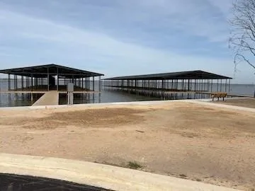 Dual covered boat slips with direct water access