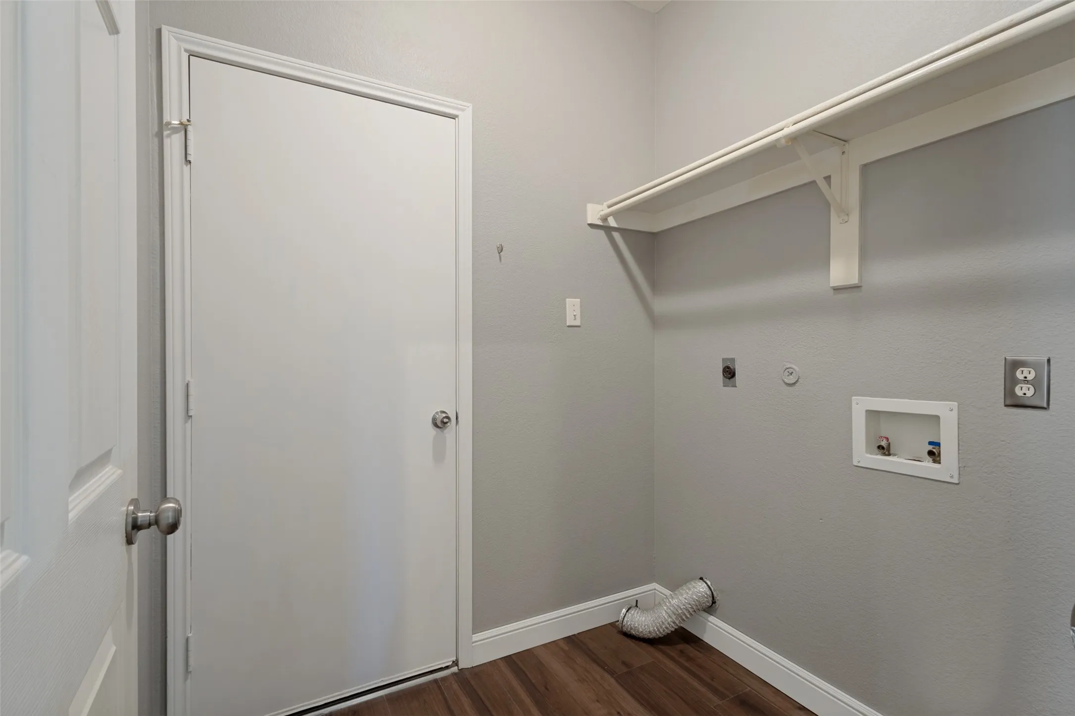 Laundry room leads to the garage.