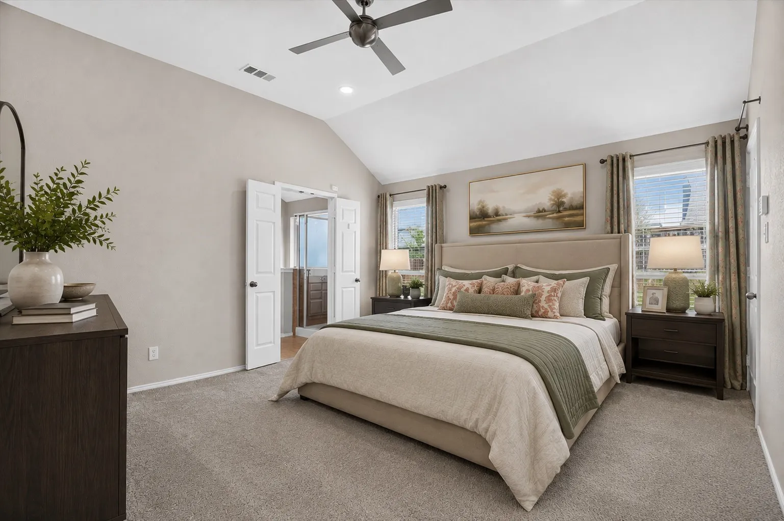 Virtually staged Vaulted ceiling with a ceiling fan, carpet flooring, dual windows with blinds, and double doors