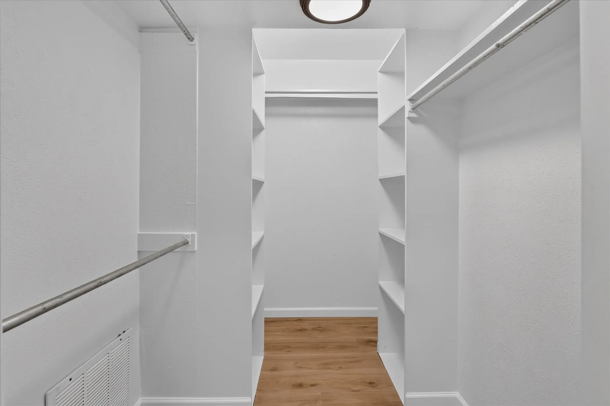 Walk in closet for the primary bedroom