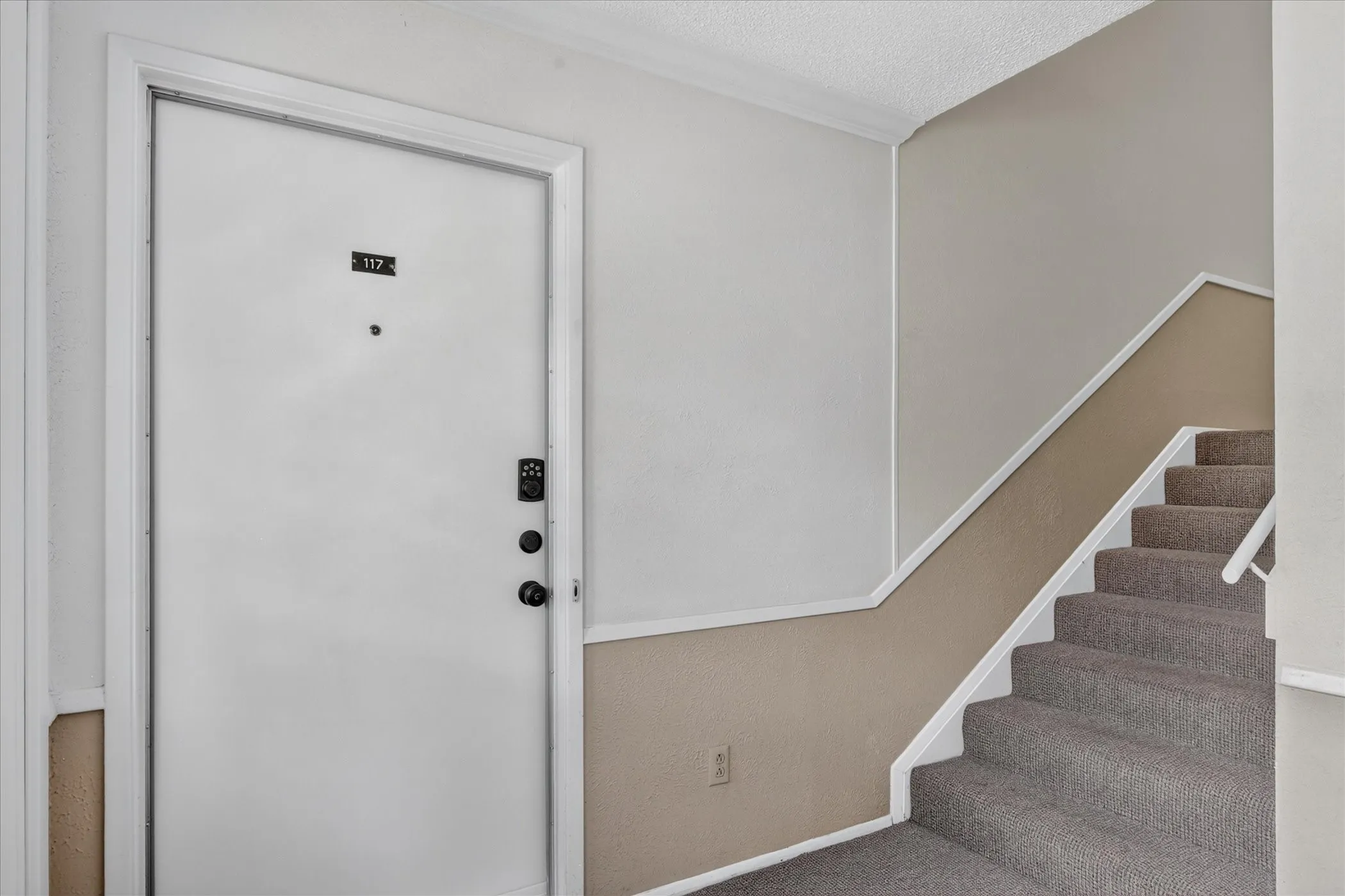 Here's your entry on the ground level. Your neighbor will use the stairs.