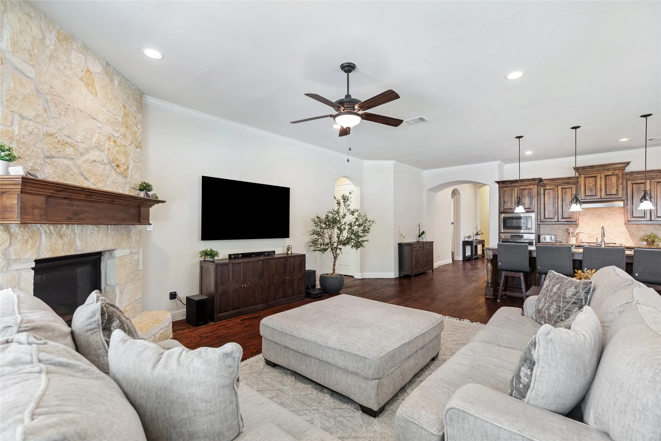 Open floor plan living room with view towards kitchen