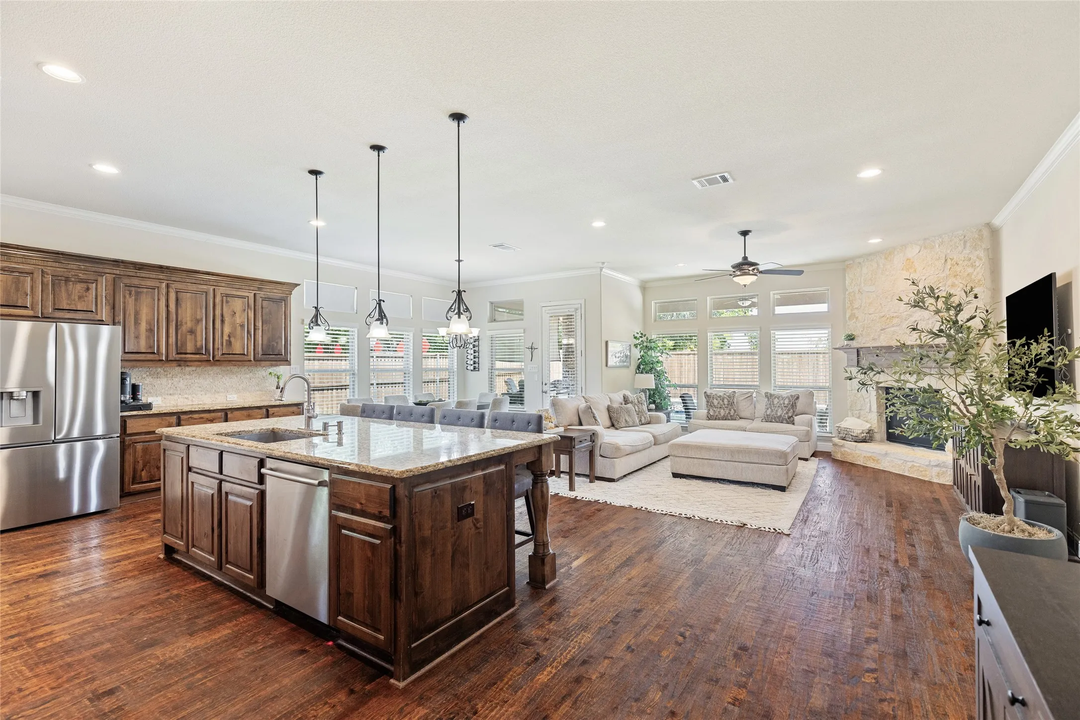 Kitchen overlooking living room and breakfast area