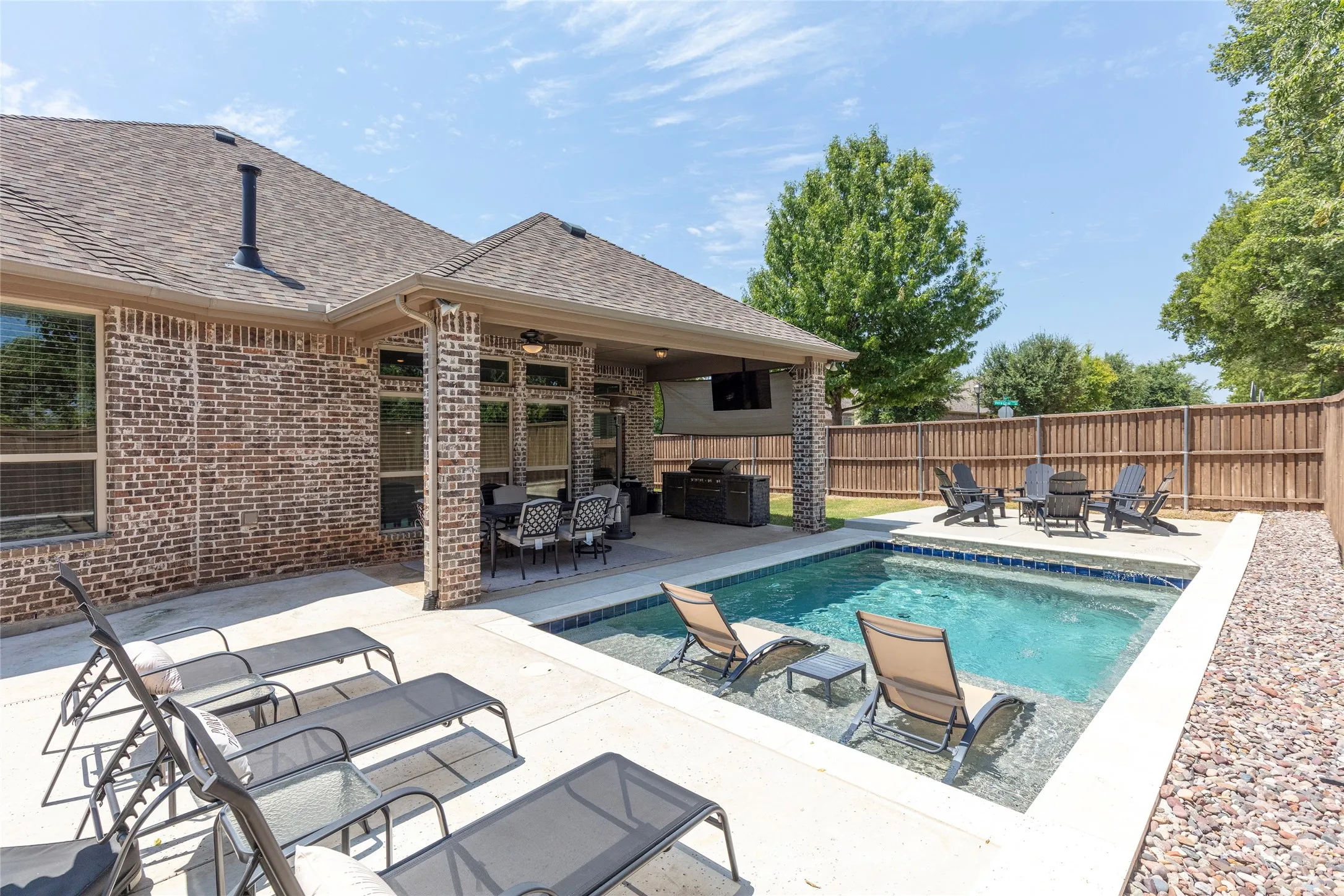 sparkling pool with spacious sunning area