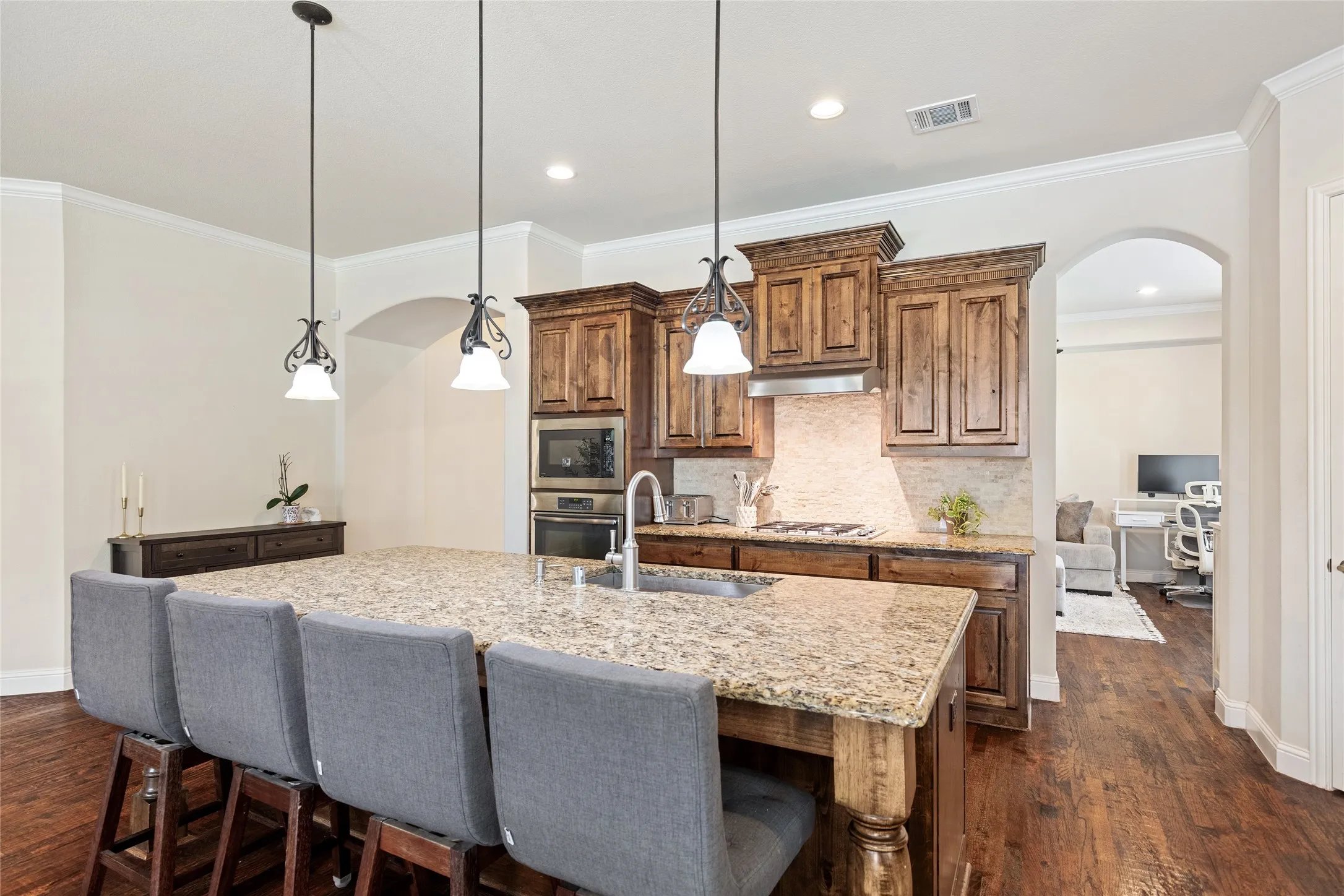 Kitchen and island, showing entry to dining room