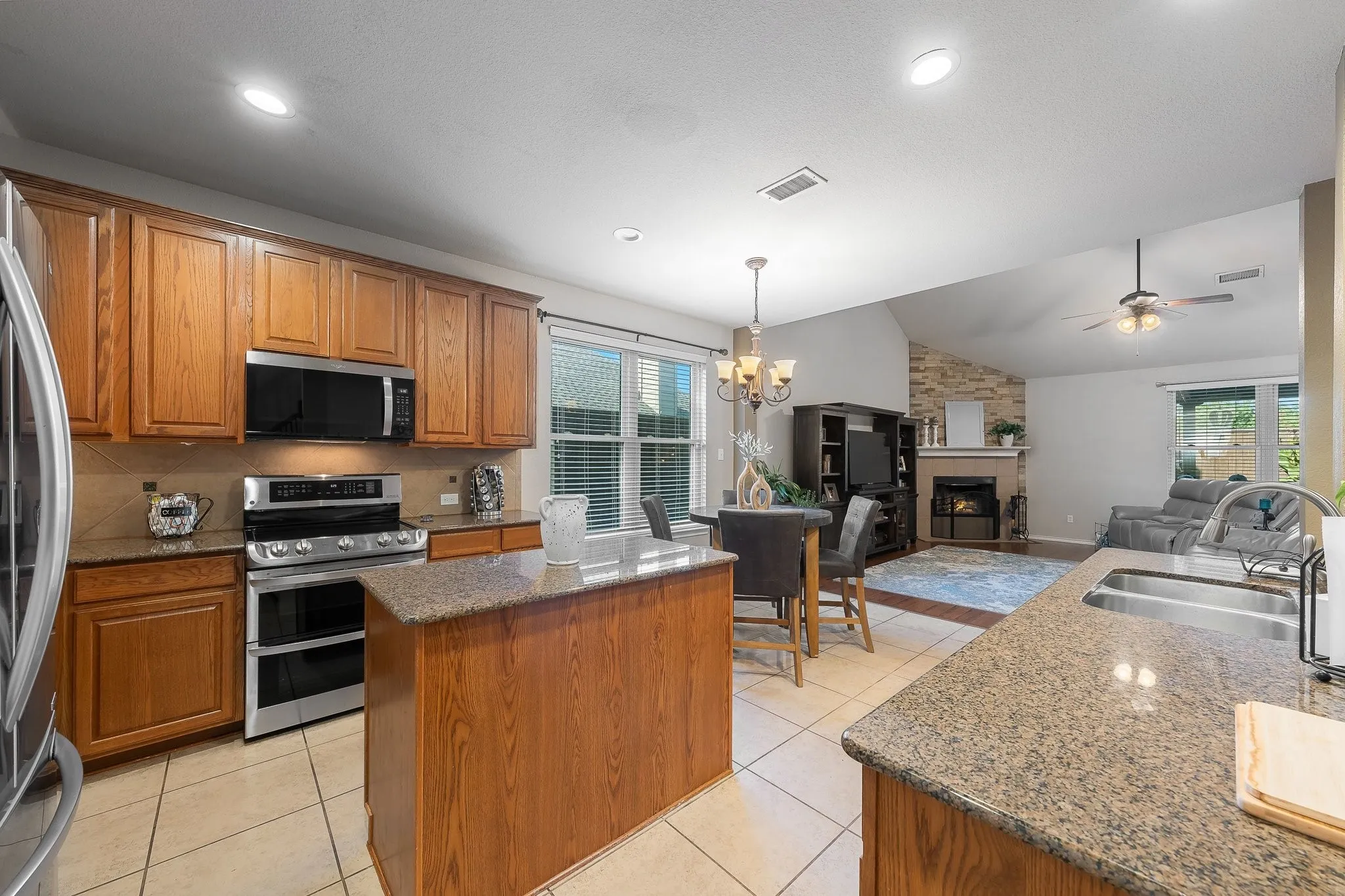 With Nook, Island & Breakfast Bar & Open to Living