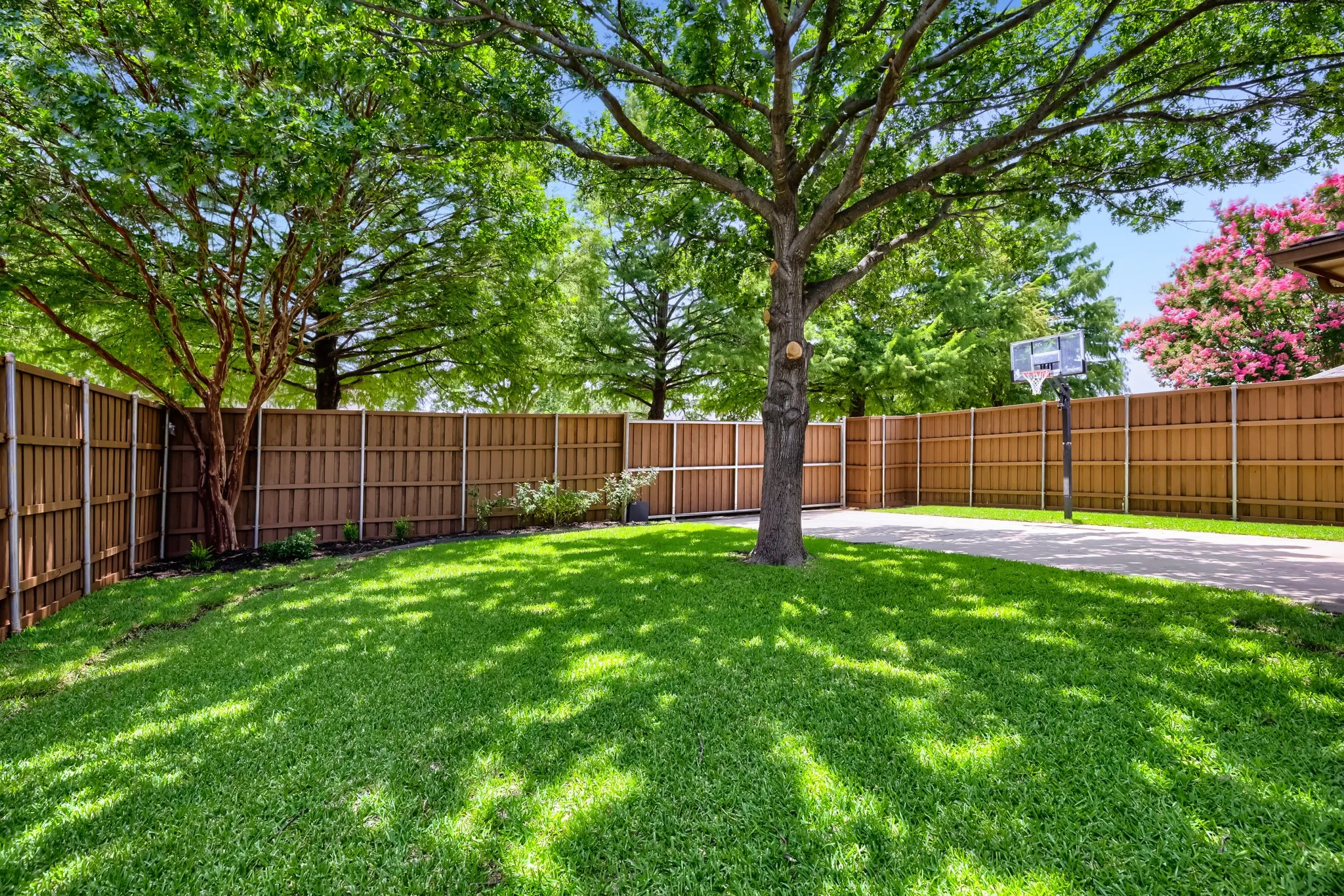 Electric Sliding Fence in back yard allows for Plenty of space