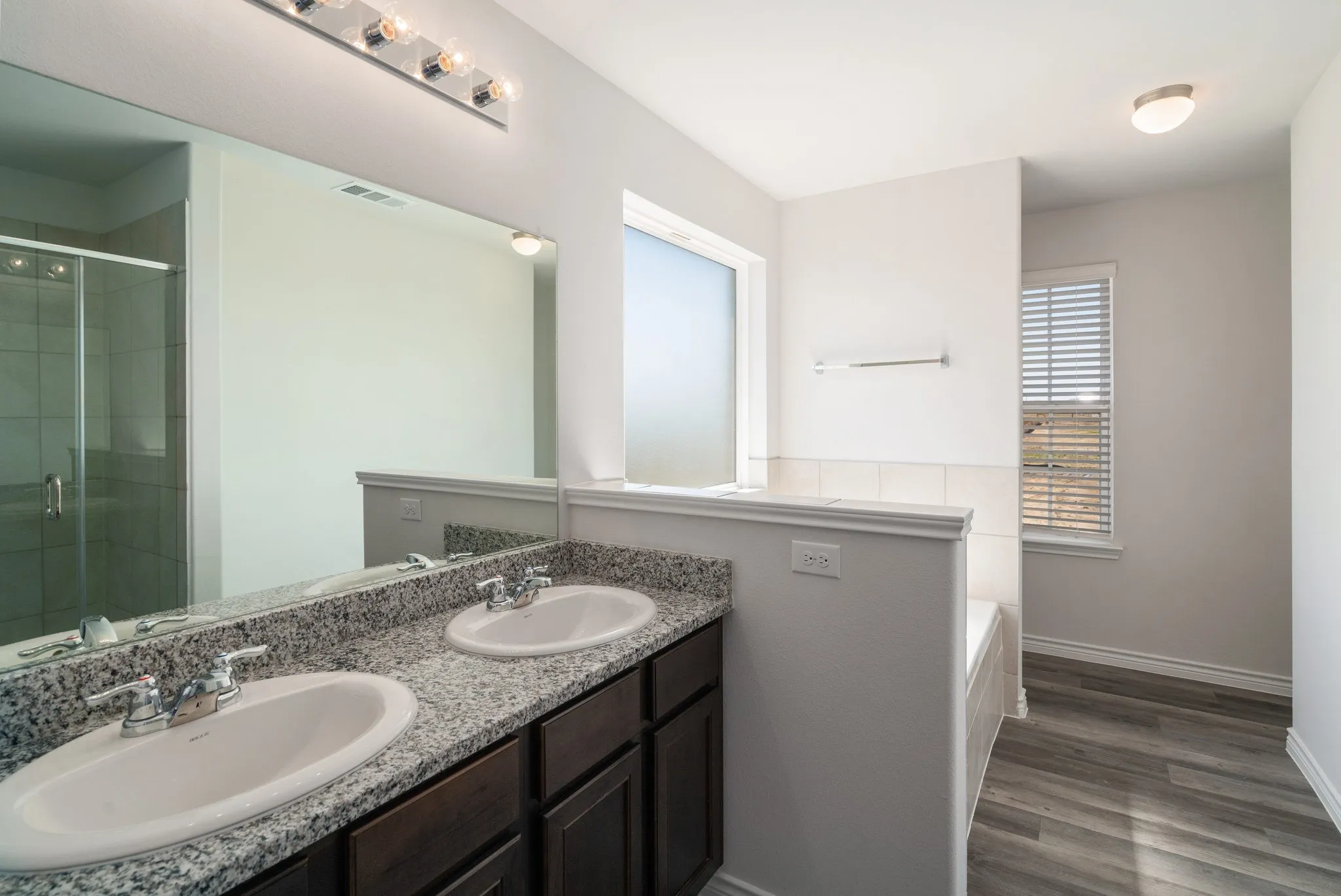 Primary bath soaking tub and stand alone shower