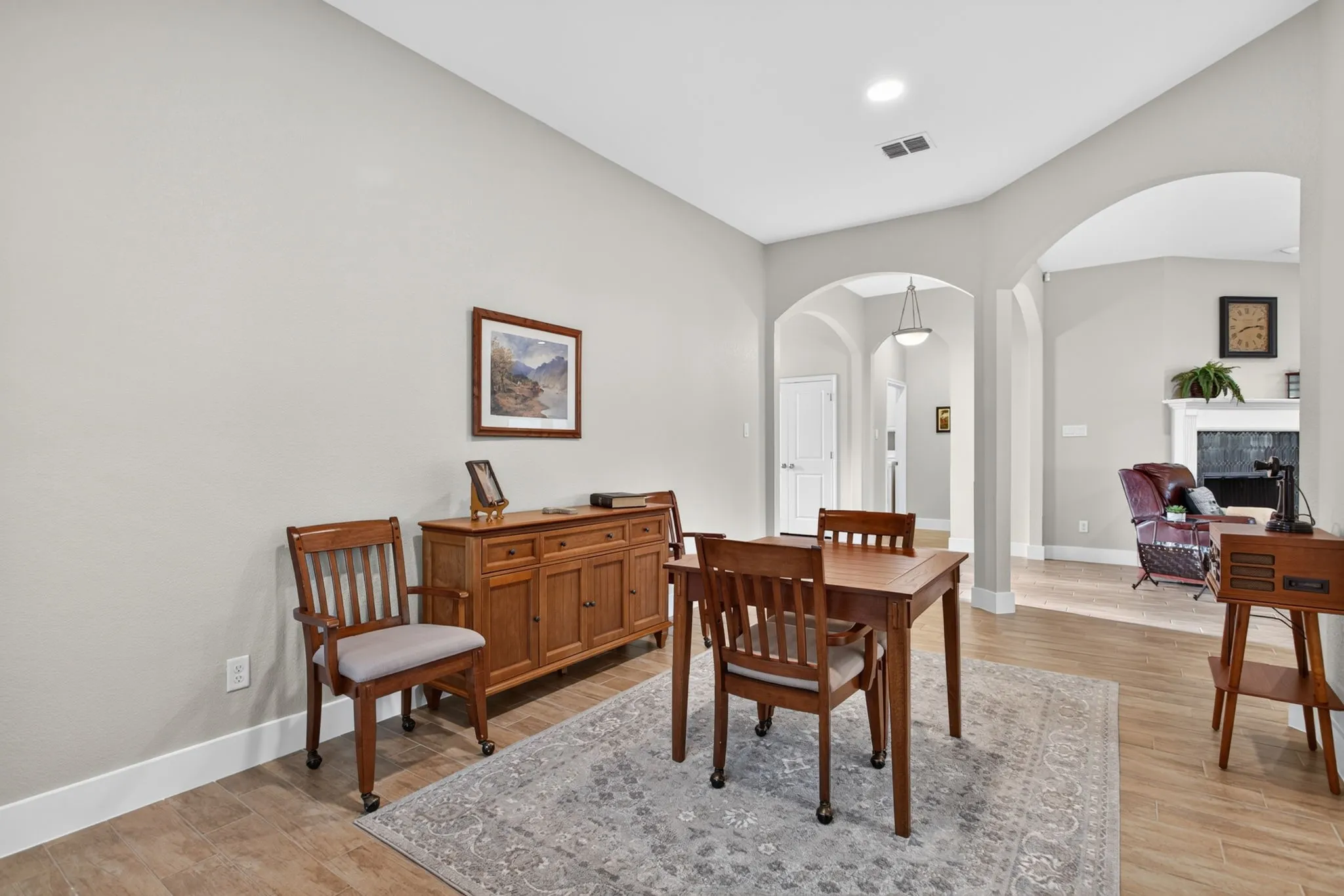 Formal dining open to foyer and living area
