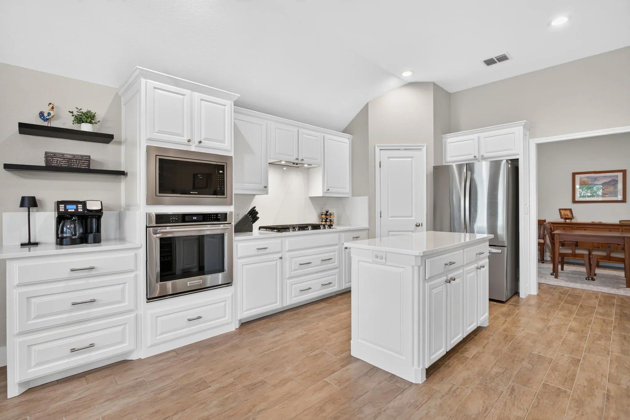 Huge kitchen with new microwave and kitchen aid dishwasher