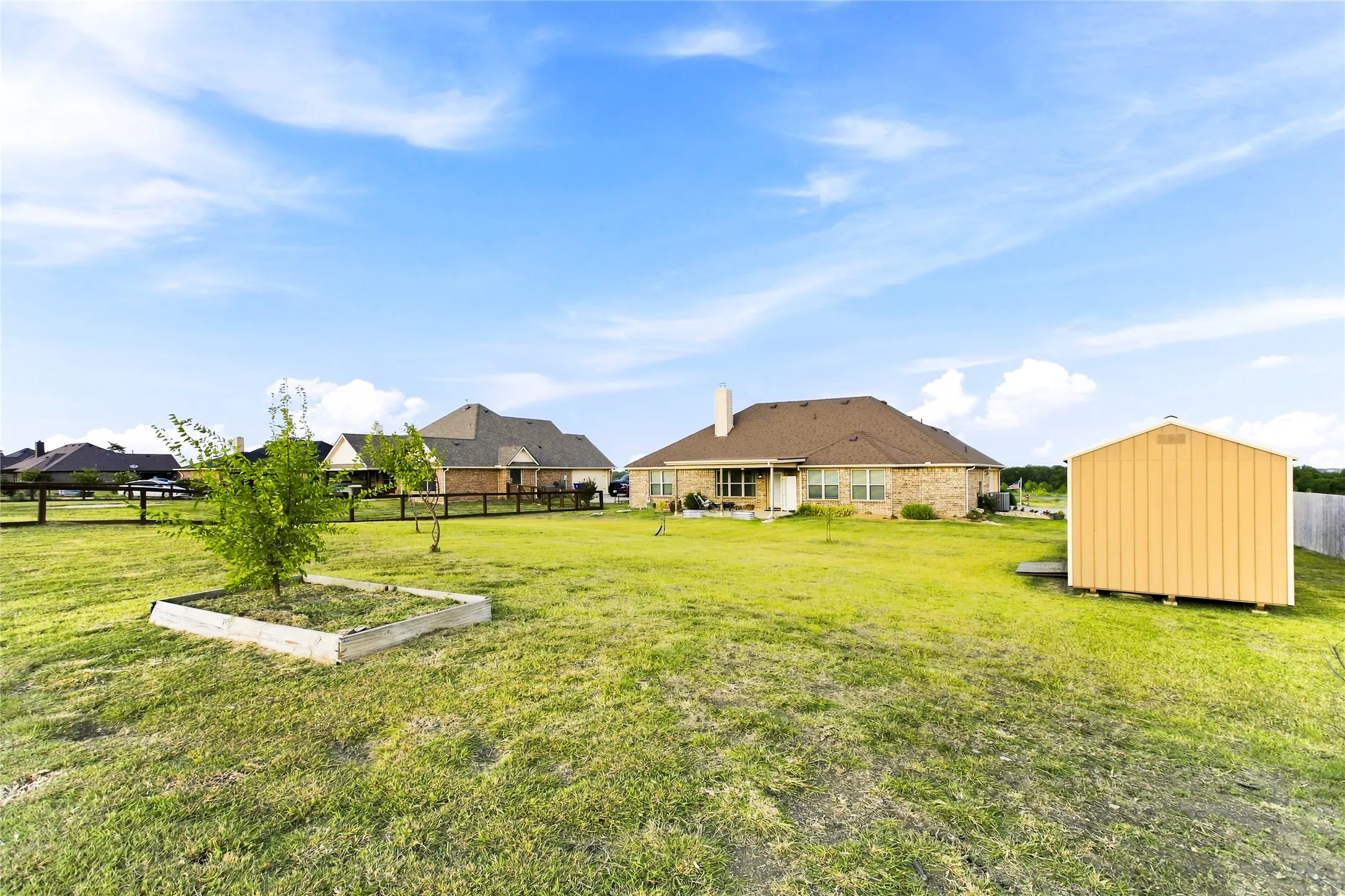 On the back side of the home, you have a big open grassy field.  Room for you to determine your own use.