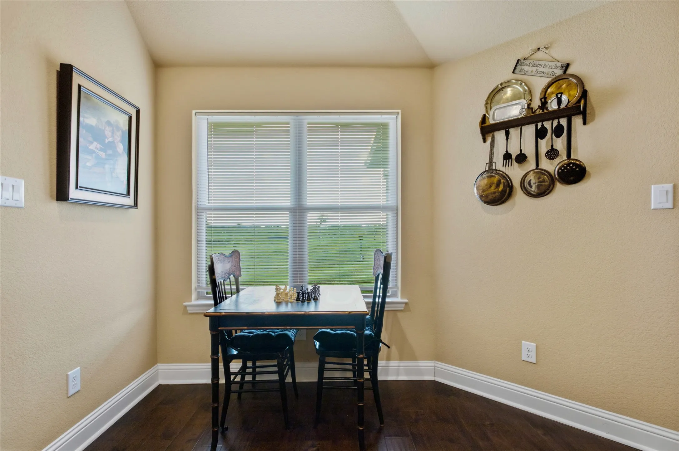 The eat-in kitchen sits in its own area with great windows that face the backyard.