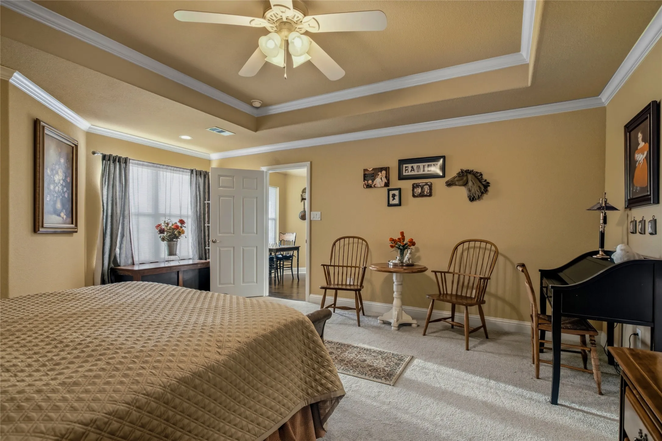 From the back left of this room, you can see th elarge window that opens out to see the back yard, as well as the door to the kitchen, the seating area, and the office space!  This is a great room!