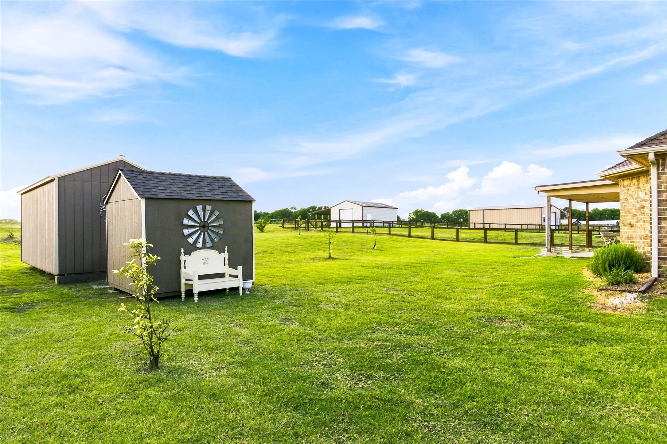 A location picture that shows how the buildings are set up.  Wide open spaces in front and in back - gorgeous Texas sky!