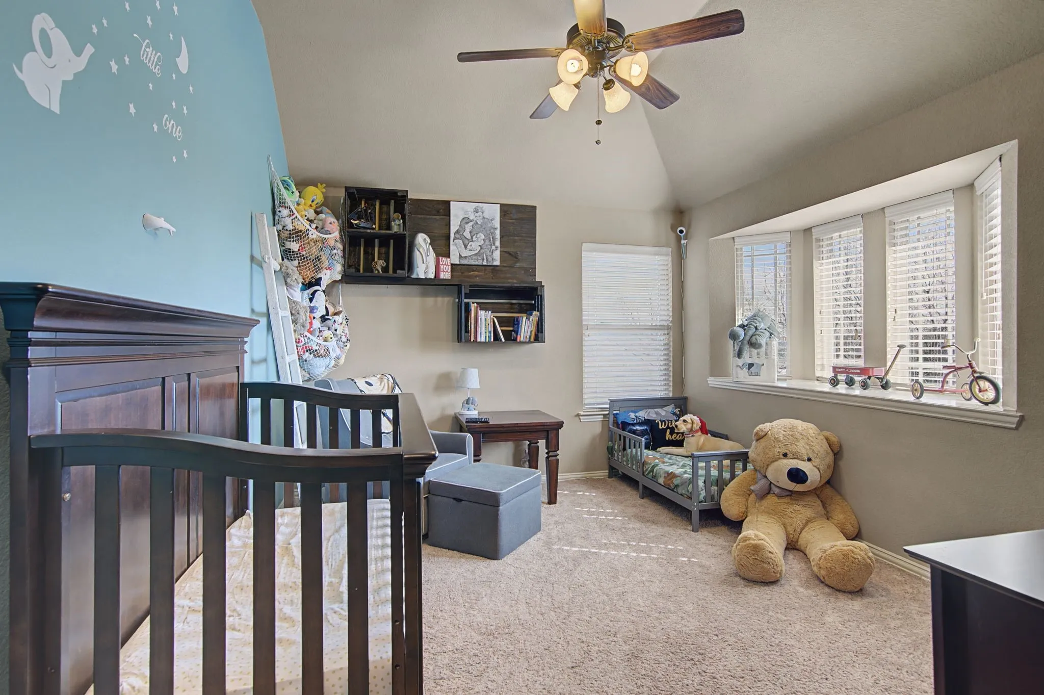 another upstairs bedroom.  As shown it easily accommodates space for 2 kiddos.  All the bedrooms in this home are spacious and include walk-in closets.