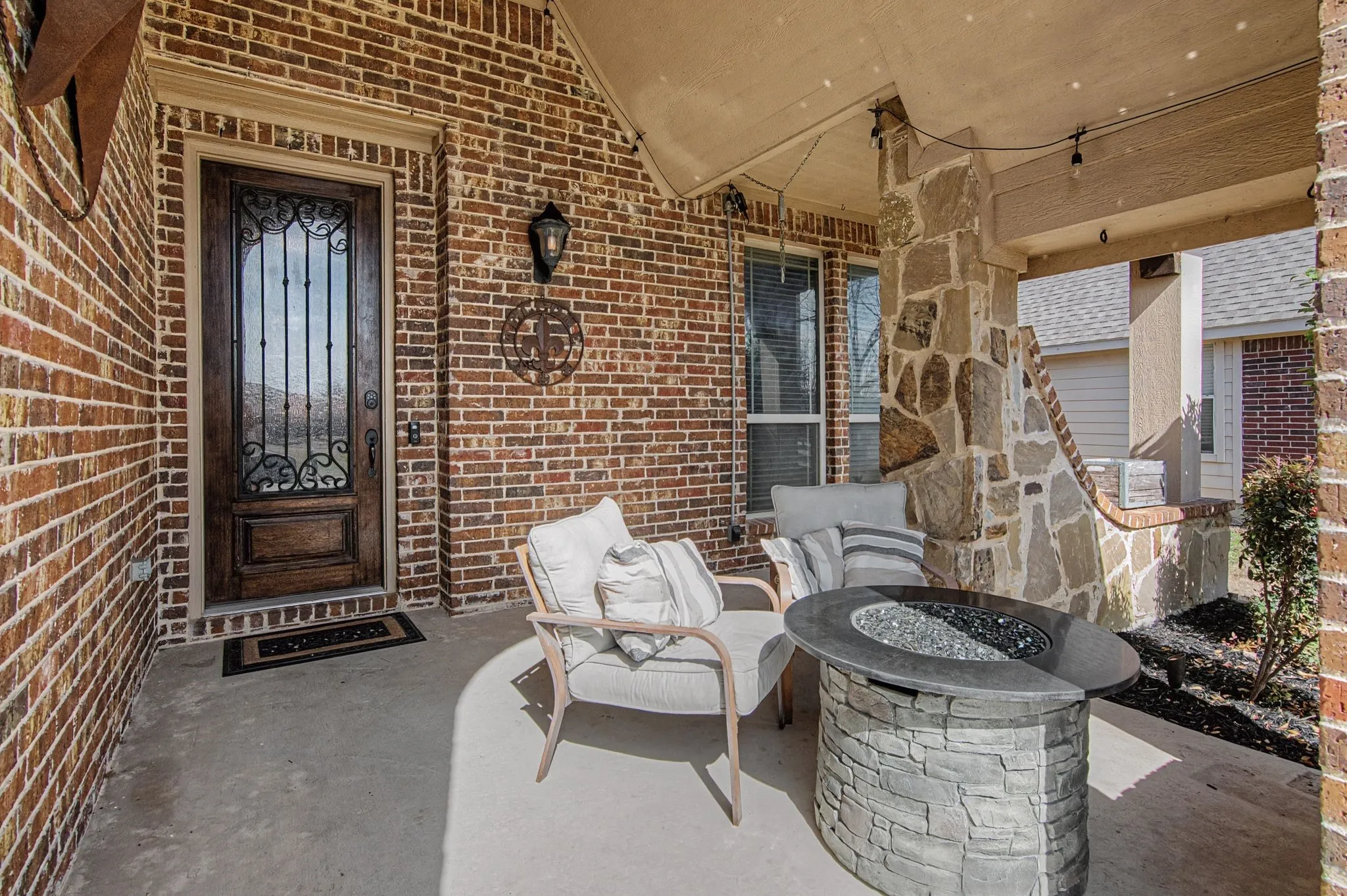 Large covered front porch.  Room for seating and a firepit, a porch swing and a view you will love! Your new home is situated directly across the street from one of the greenspaces with a pond in this community.