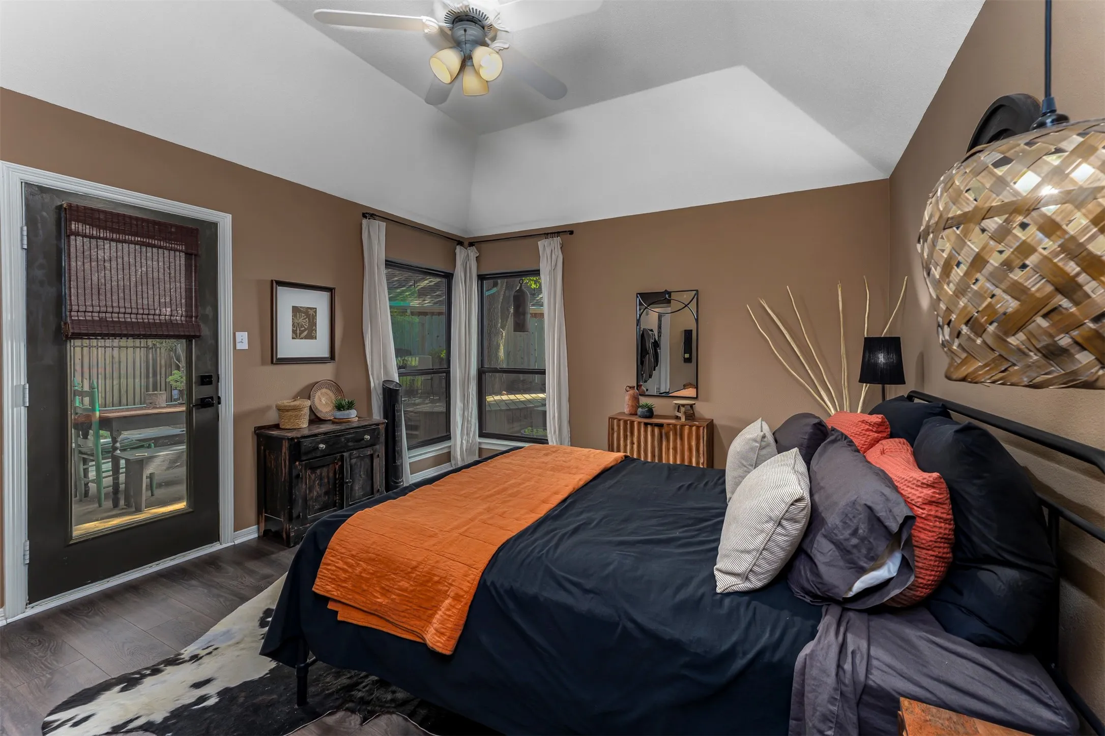 Primary Bedroom Suite with Vaulted Ceiling and SkylightThis generous bedroom features a distinctive vaulted ceiling with integrated skylight, flooding the space with natural light