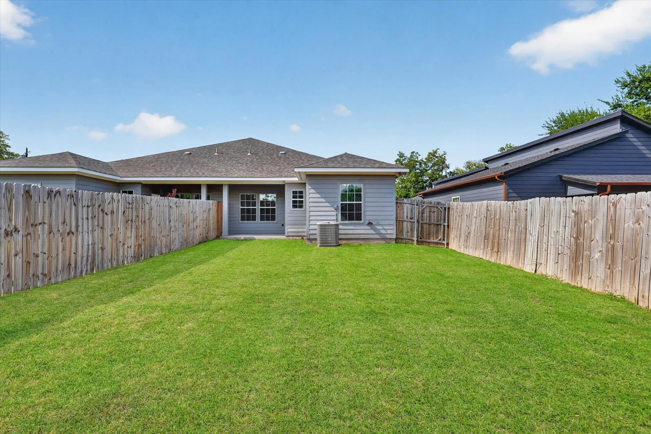 Fully fence backyard with covered patio!
