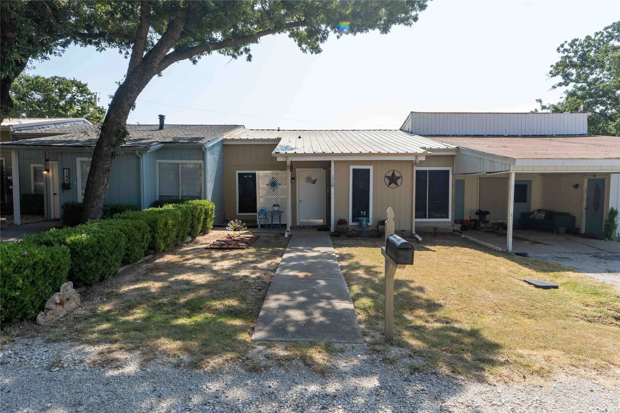Townhouse For Sale in Wise County , 1229 Elm Court, Runaway Bay, Texas 76426, 2 Bedroom, 2 Bathroom, Garage spaces, 1,134 Sqft, built in 1987, mls#21352875, Real Estate Agent in Runaway Bay, Homes For Sale in Wise county, Homes For Sale in Runaway Bay, Realtor in Runaway Bay Texas, Real Estate Brokerage Independent Realty Texas, Luminita Cordes Realtor