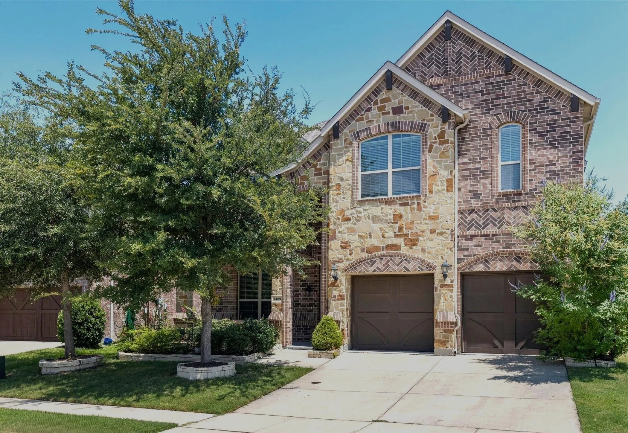 Stone and brick facade with arched accents