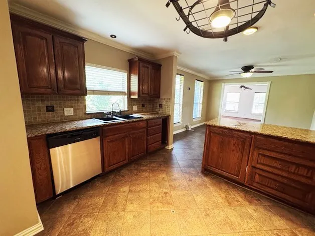 Kitchen showing view into dining area