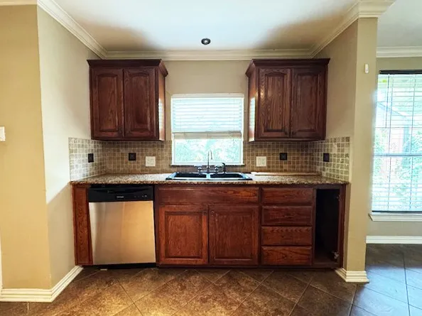Kitchen view of sink and outside window