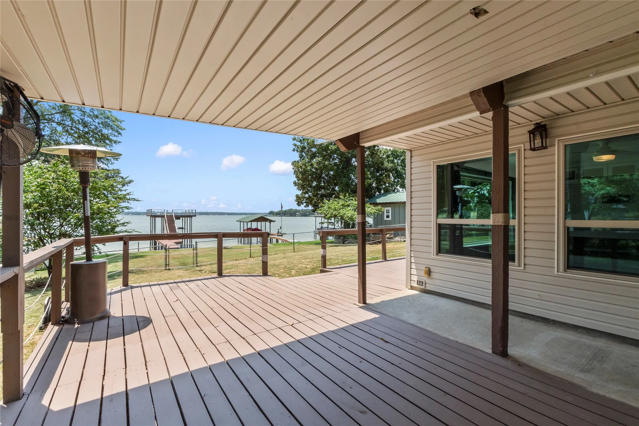 Covered side deck showcasing beautiful open water views.