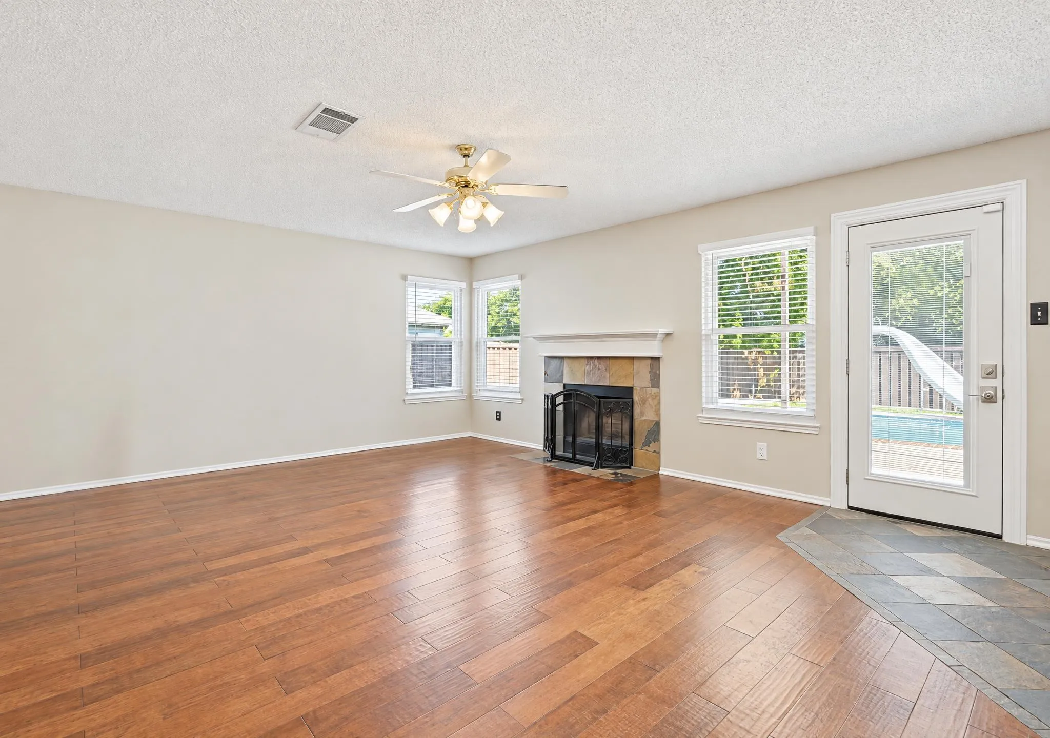 Spacious and inviting living area designed with family gatherings and entertaining in mind, offering a comfortable space to create lasting memories.